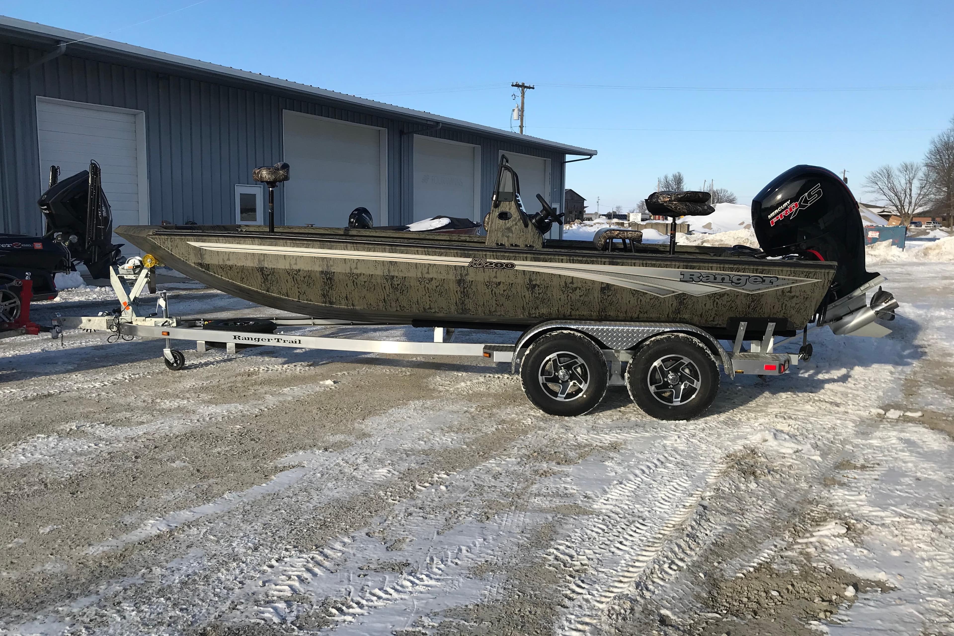 2026 Ranger RB200 boat on trailer, parked outside in snowy setting.