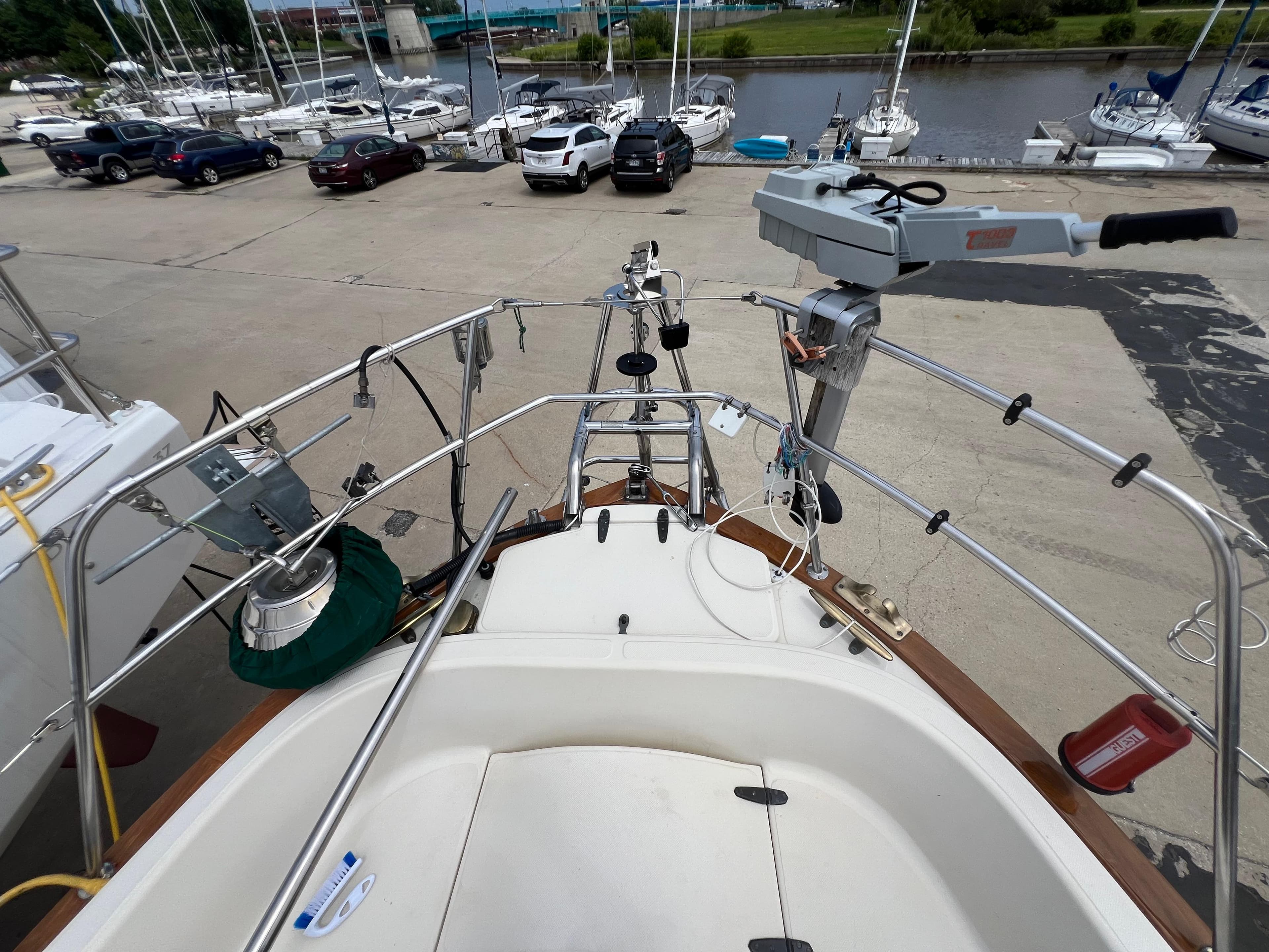 1994 Pacific Seacraft 34 sailboat docked, view of the stern and marina.