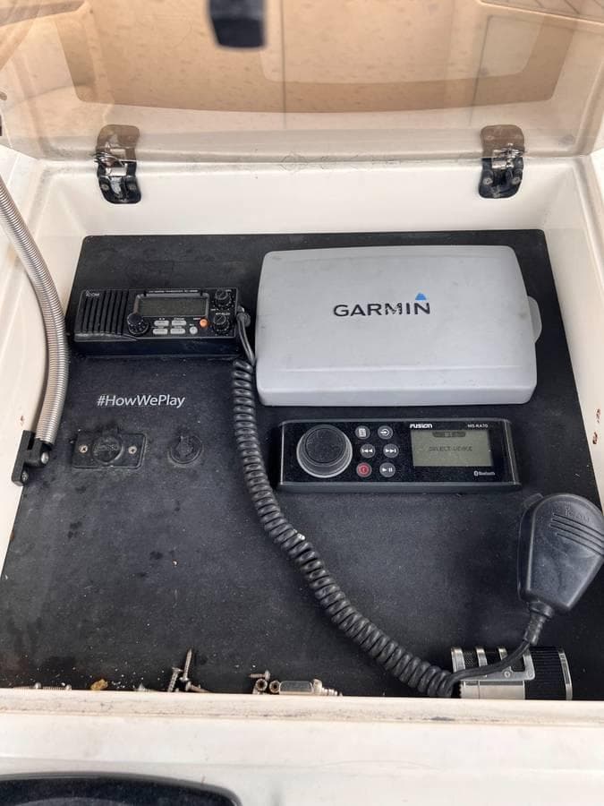 Control panel of a 1996 Intrepid 370 Cuddy with Garmin and Fusion equipment. #HowWePlay