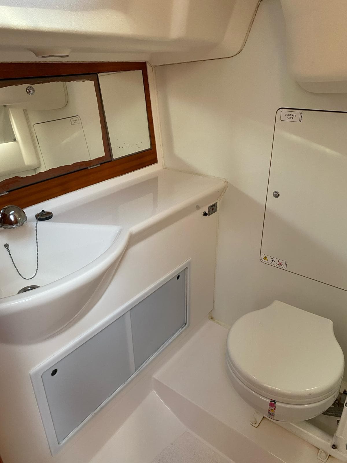 Interior of 2009 X-Yachts X-34 with sink and toilet.