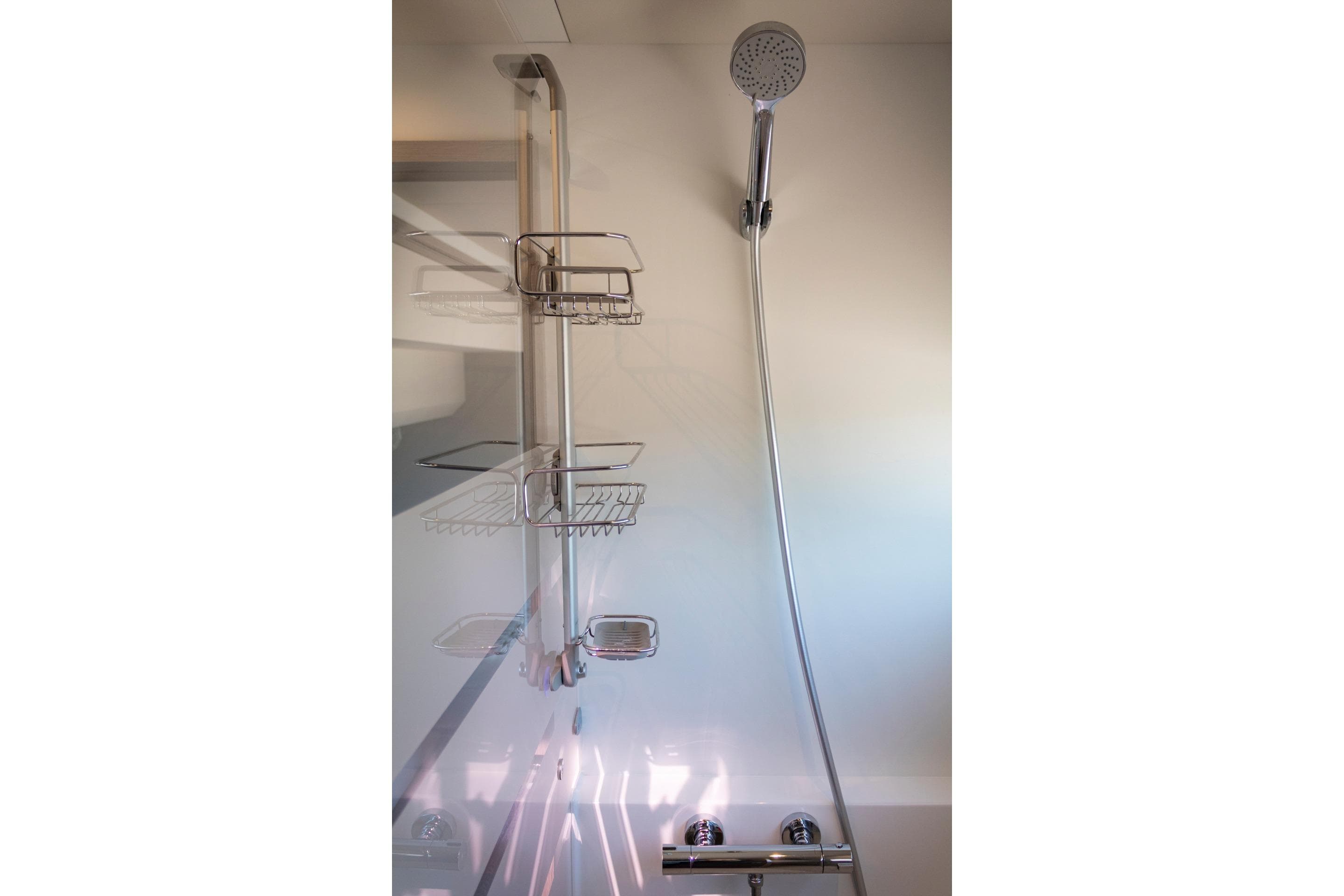 Modern shower setup in 2024 Fountaine Pajot MY5 yacht bathroom.
