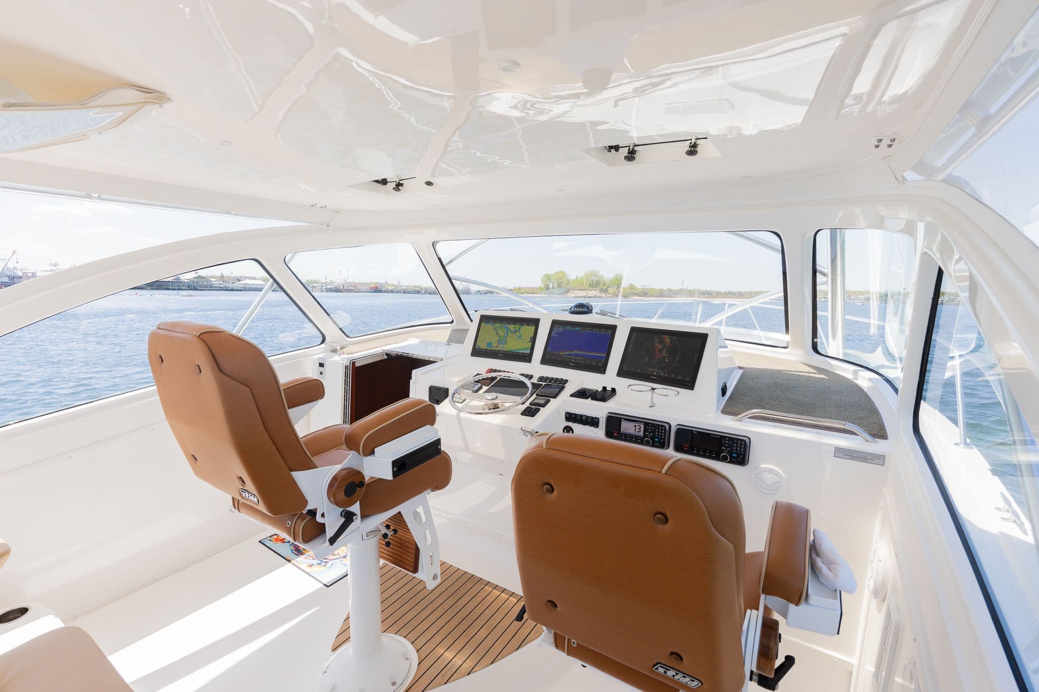 Interior of 2022 Albemarle 36 Express with modern helm console.