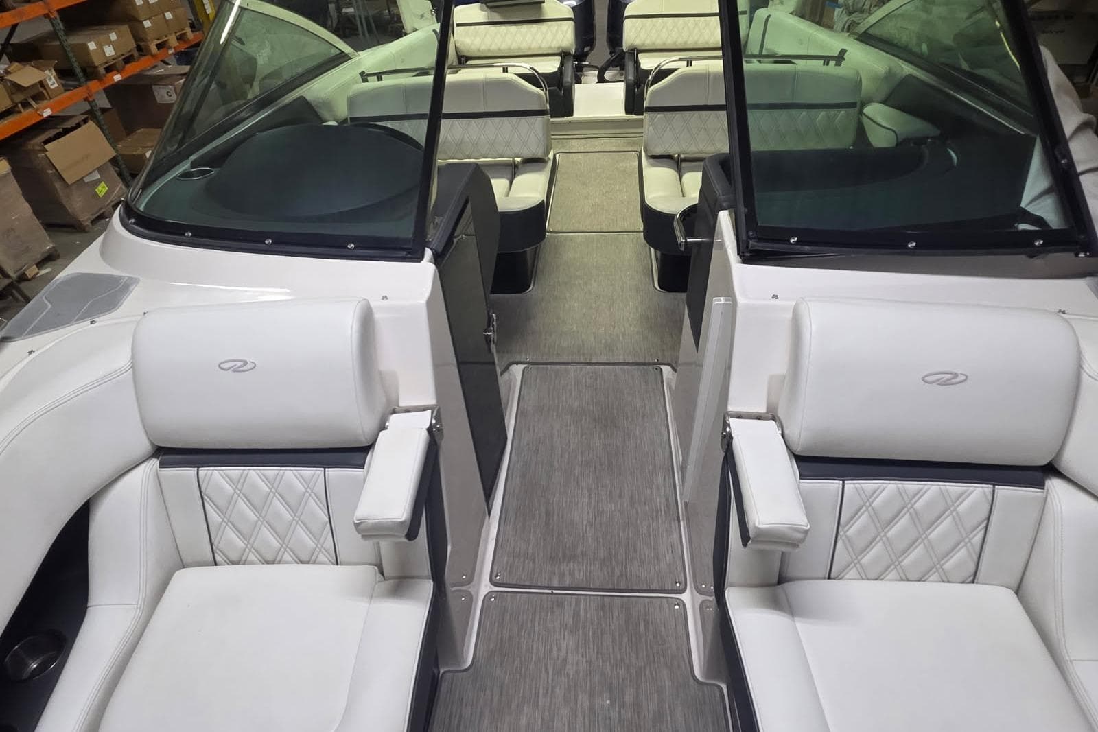 2019 Regal 29 OBX boat interior with luxurious white seating and modern design.