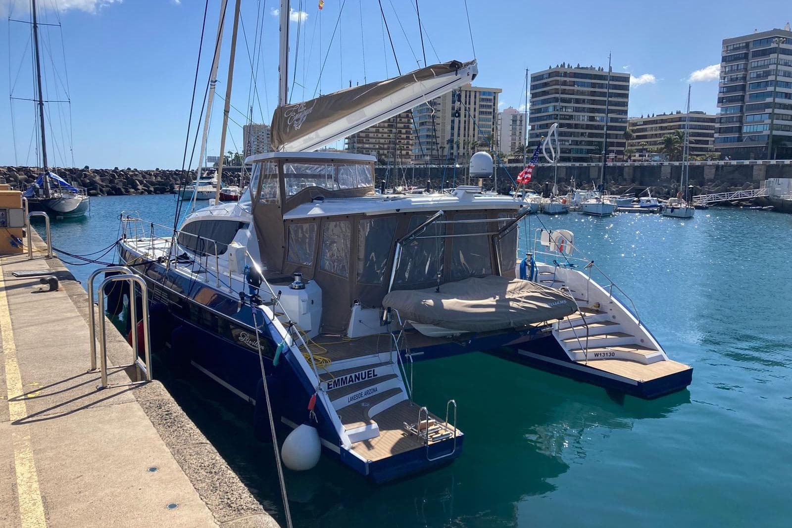 Luxury Privilege 510 yacht docked in a sunny marina, 2023 model.