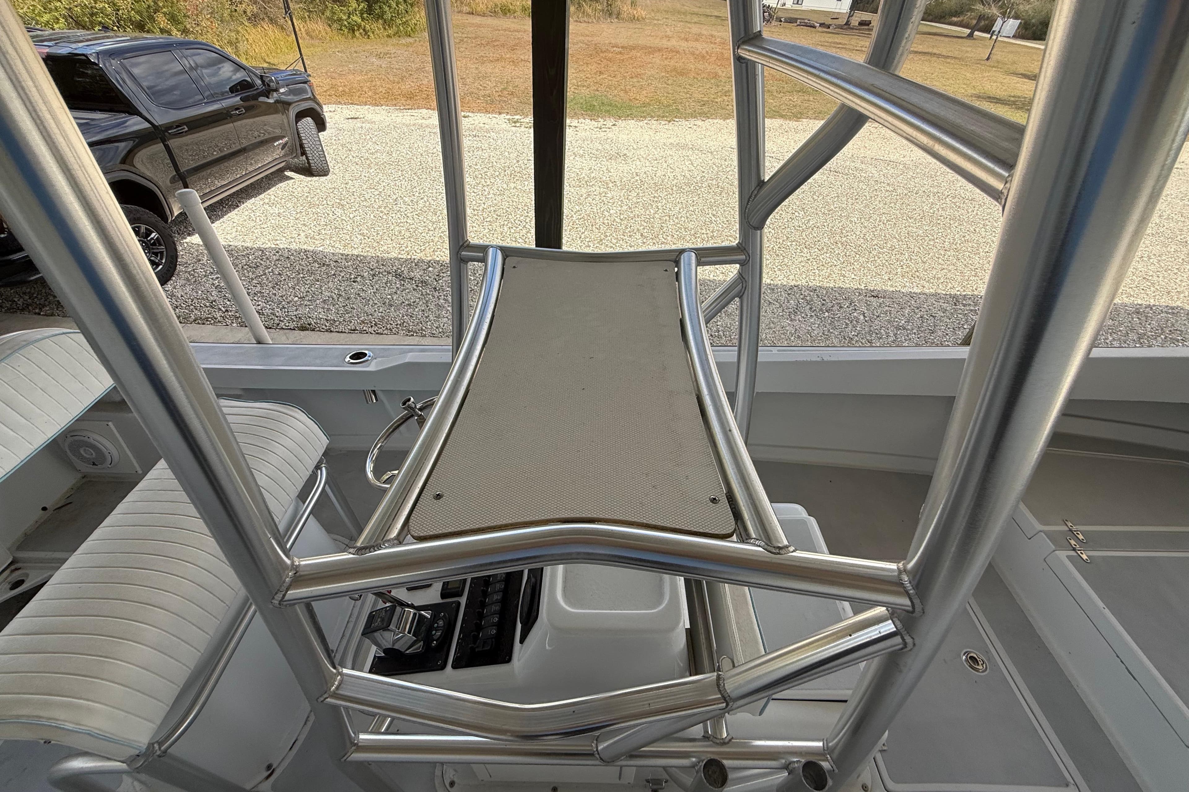 1974 Aquasport 2400 Center Console interior with seating and console view.