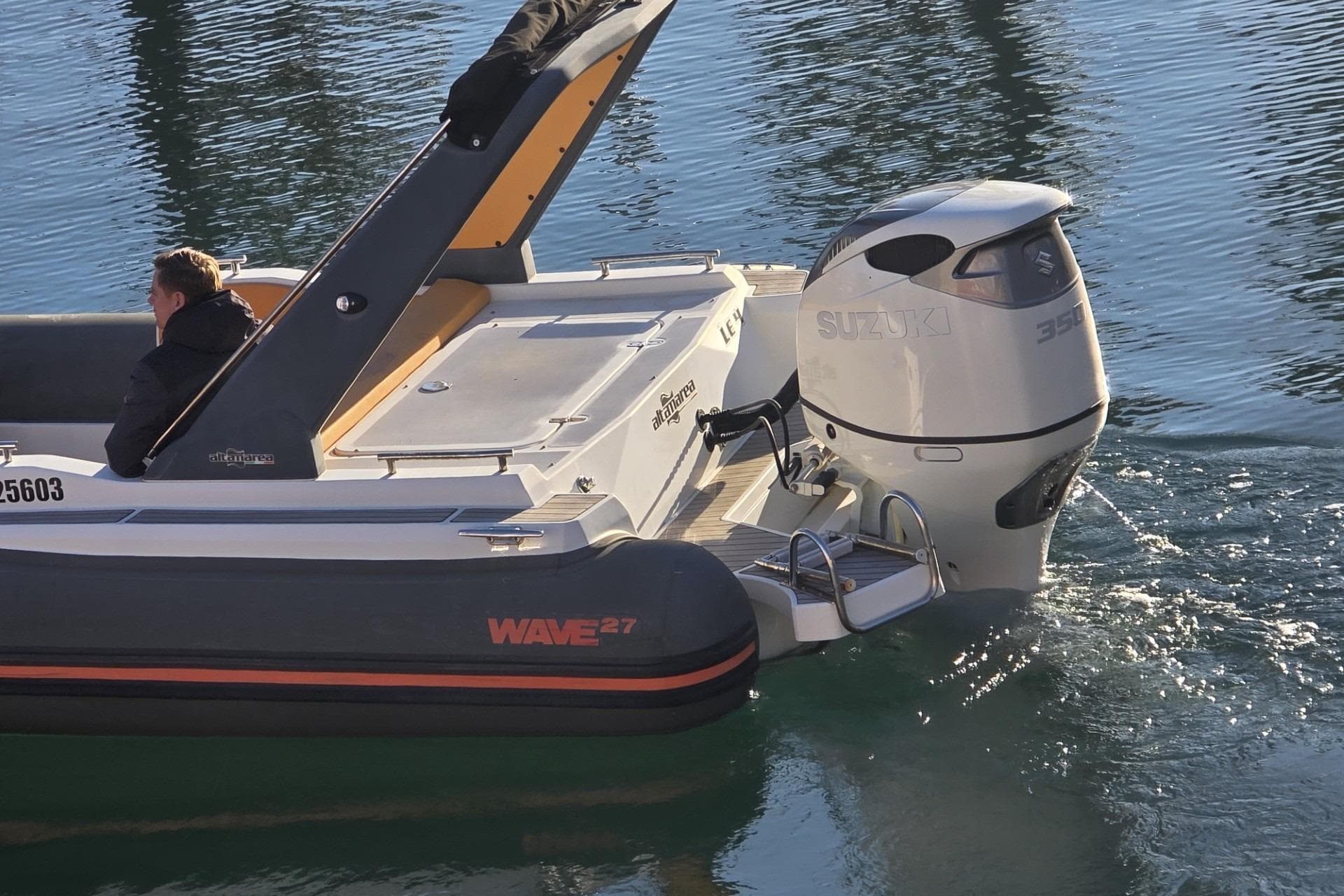 2021 Altamarea WAVE 27 boat with Suzuki engine on calm water.