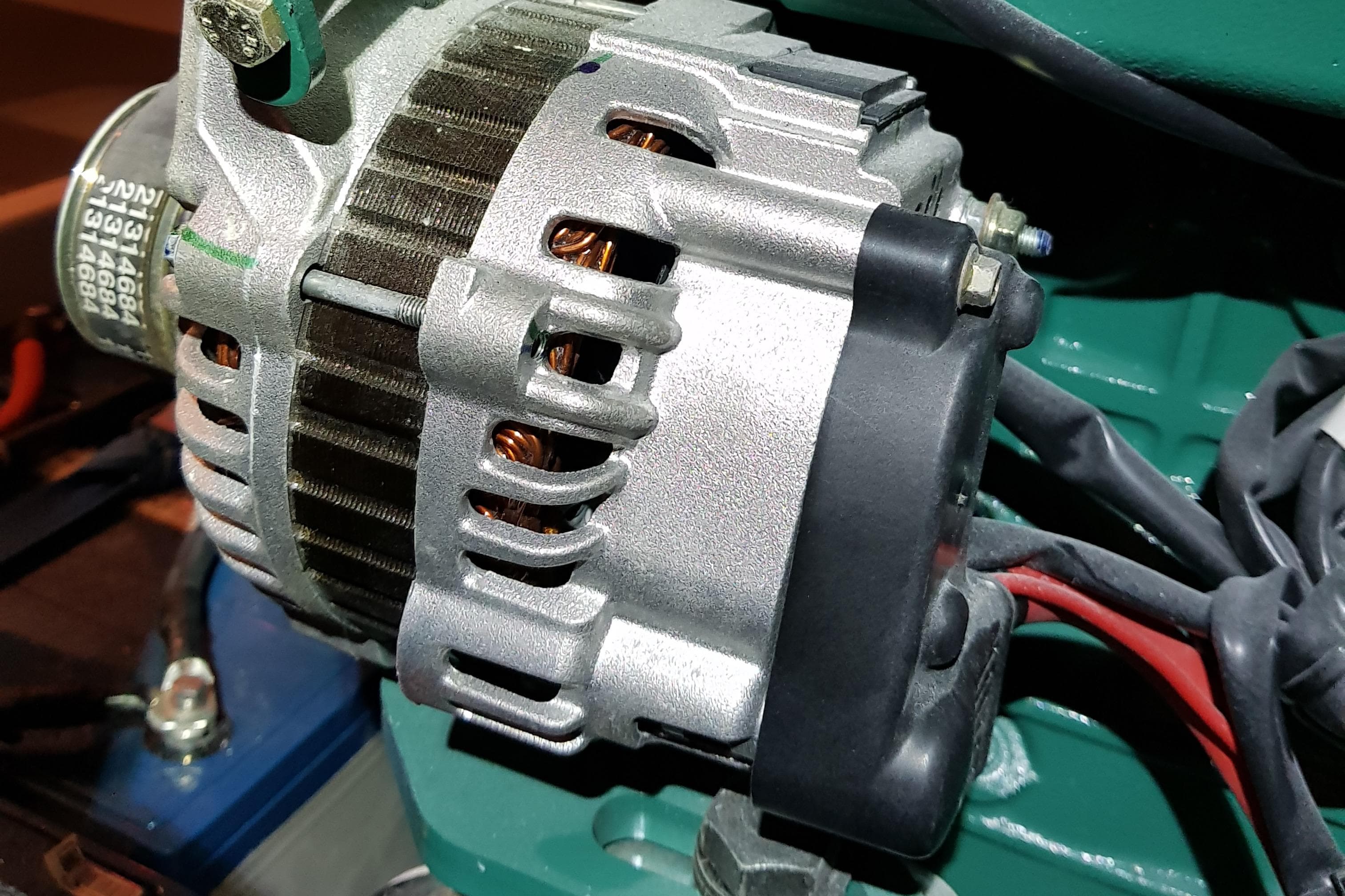Close-up of a 2017 Pogo 1250 engine component with visible wiring.