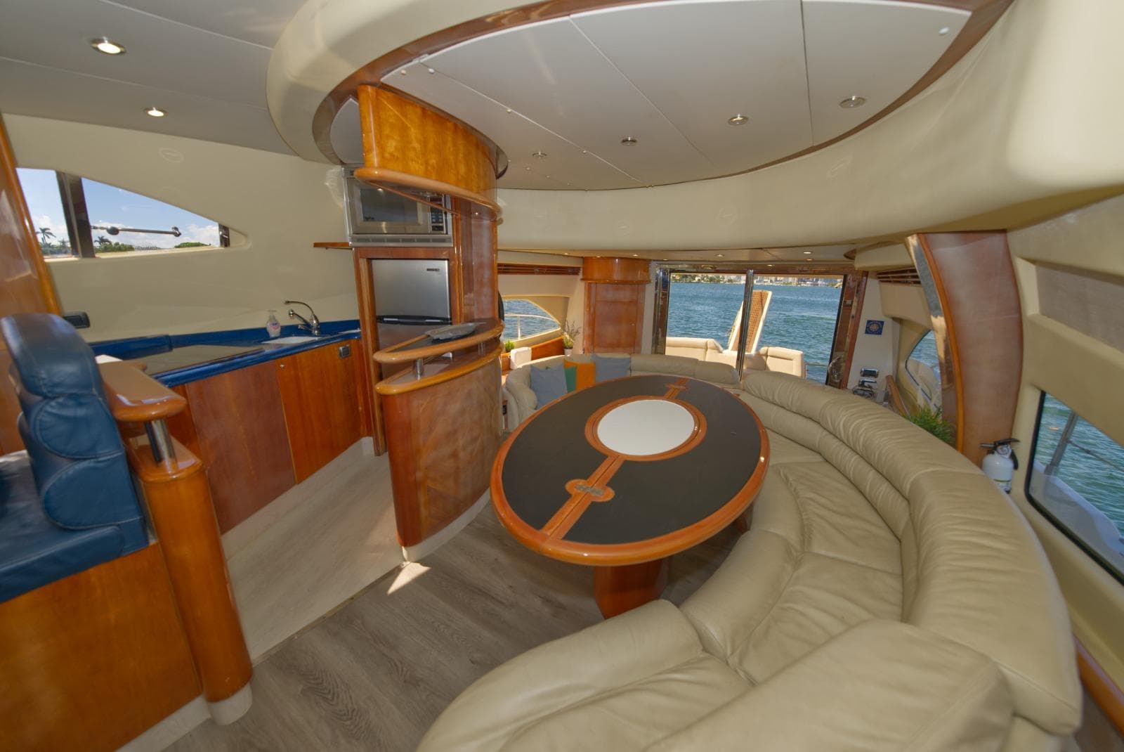 Luxurious interior of 2003 Aicon 56 yacht with elegant seating and modern amenities.