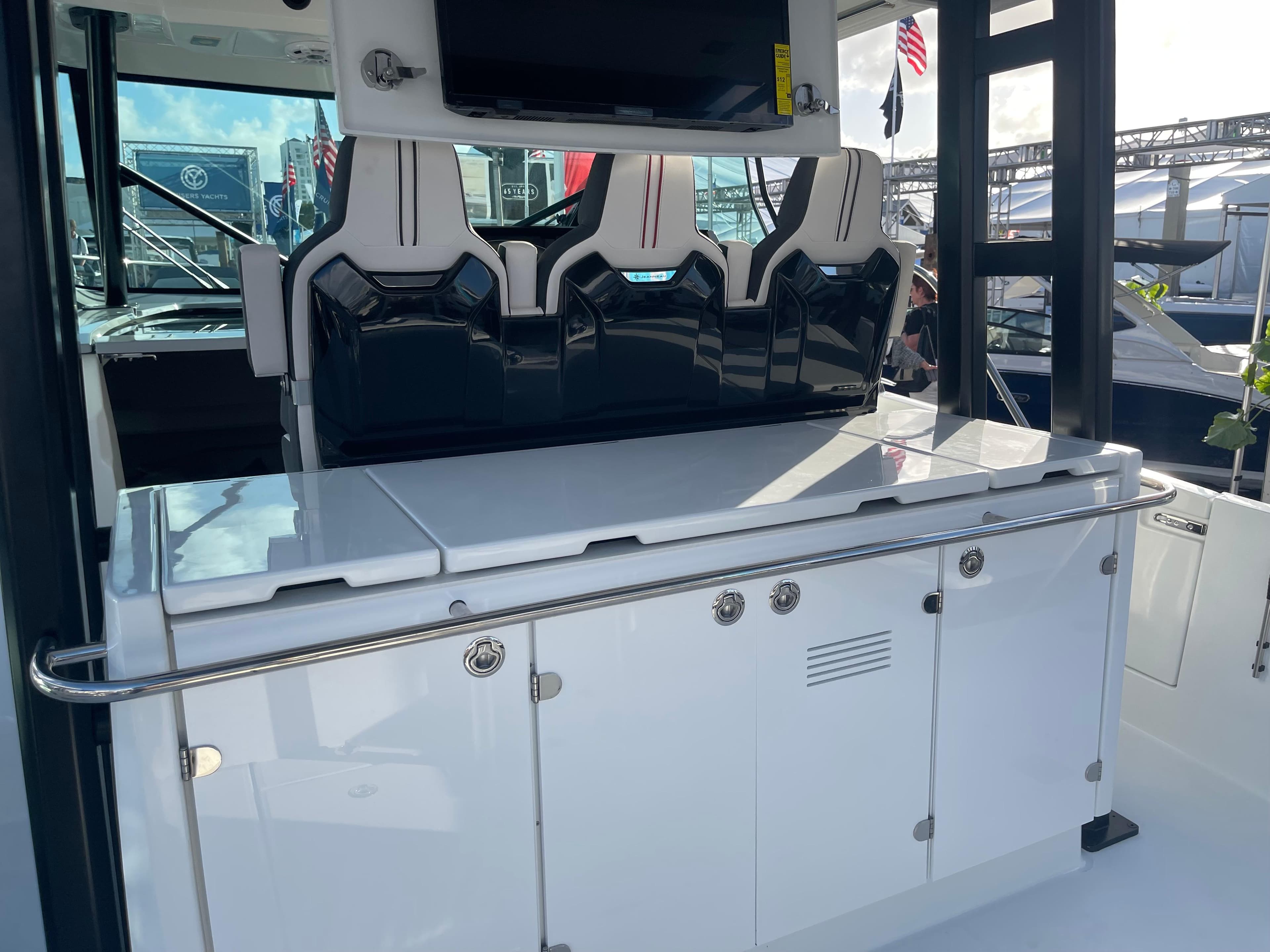 2025 Jeanneau Leader 12.5 WA boat interior with sleek seating and modern design.