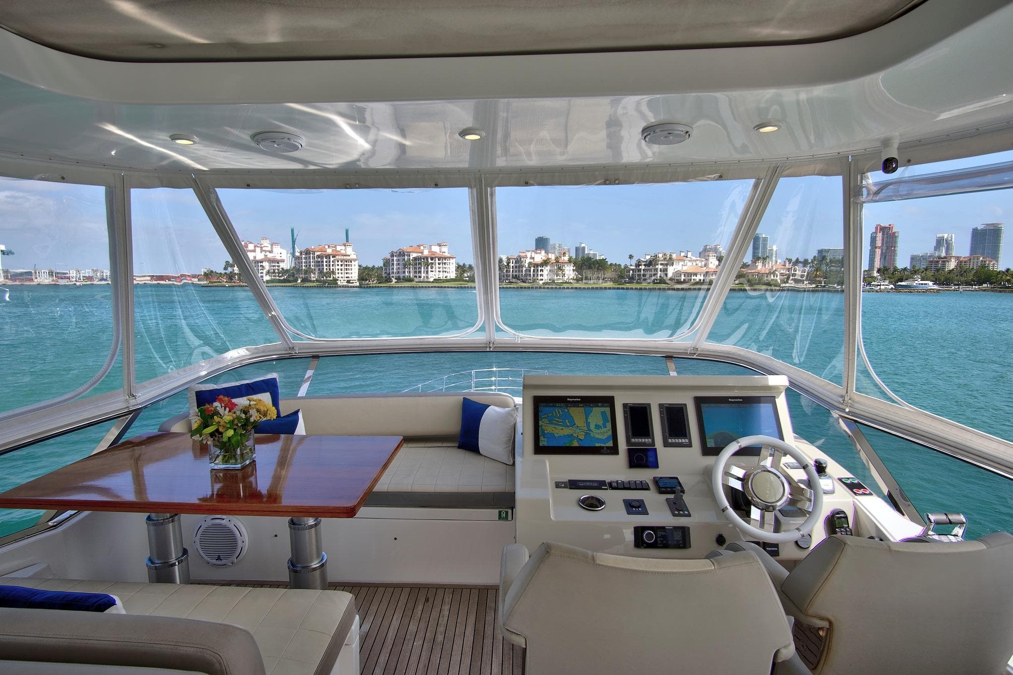 Luxurious 2017 Azimut 72 Flybridge yacht interior with scenic ocean view.