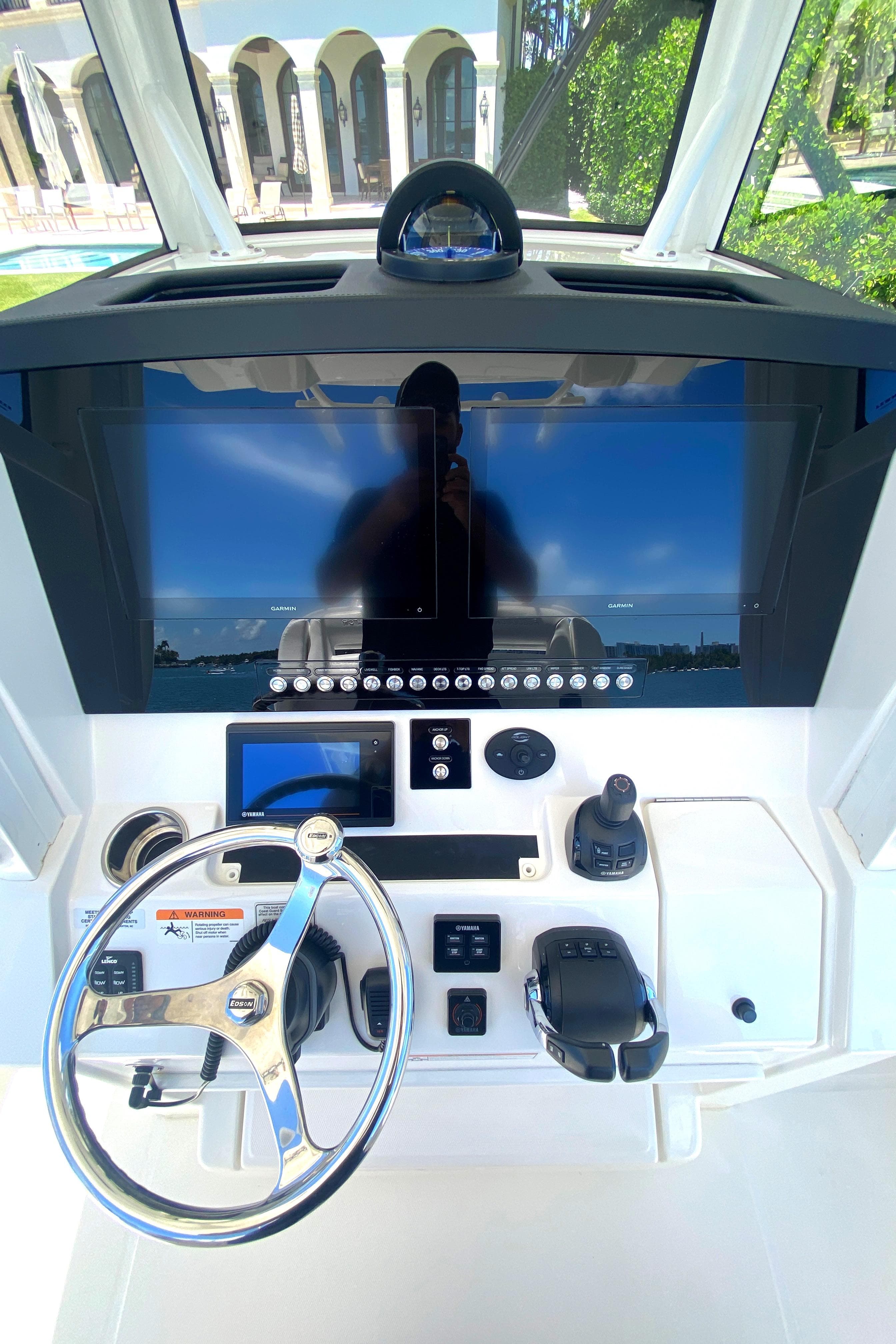 2020 Regulator 31 boat helm with modern controls and large display screen.