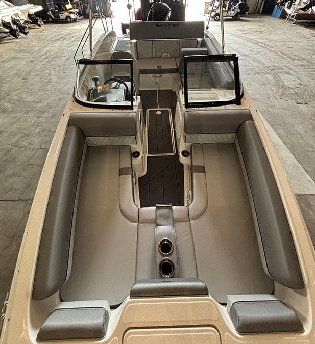 2024 Bayliner DX2000 boat interior with spacious seating and modern design.