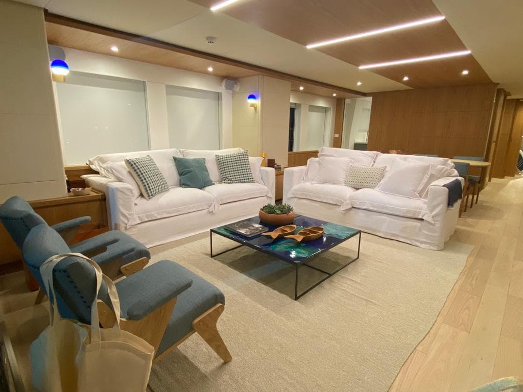 Luxurious interior of 2027 Inace Explora 90 yacht with elegant seating and modern decor.