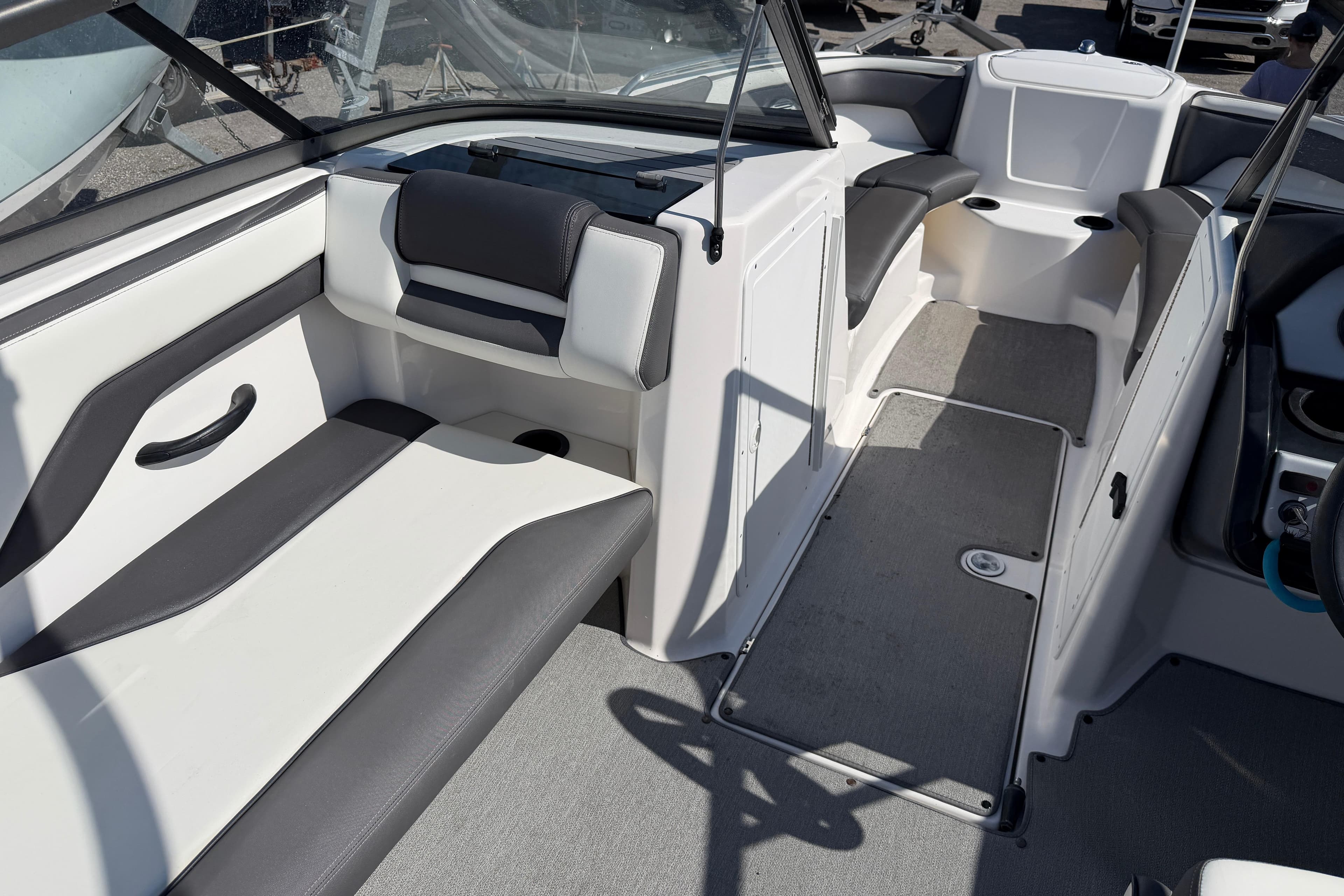 2022 Yamaha Boats AR210 interior with sleek seating and modern design.