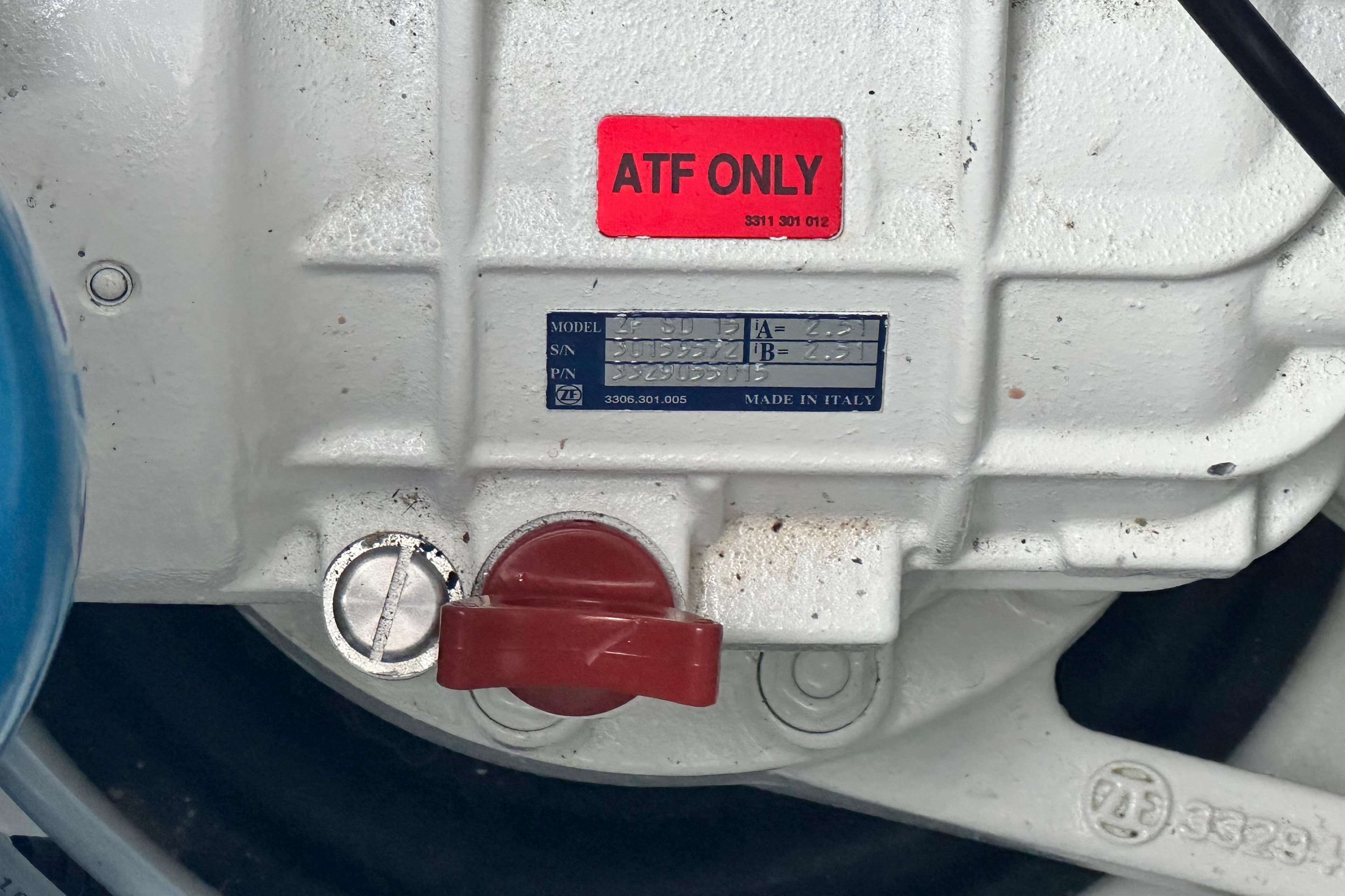 Close-up of a mechanical component with "ATF Only" label, Lagoon 55, 2025 model.