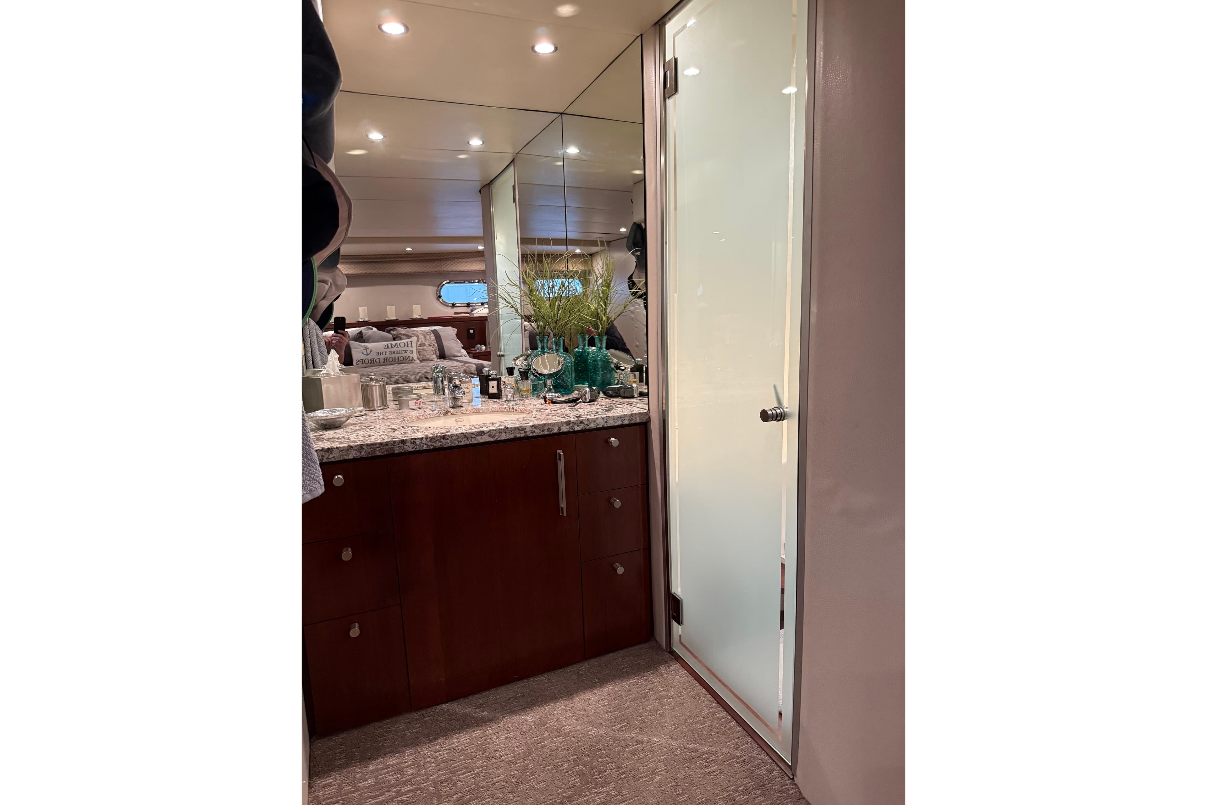 Luxurious interior of 1997 Bayliner 5788 Pilot House Motoryacht with elegant cabinetry and decor.