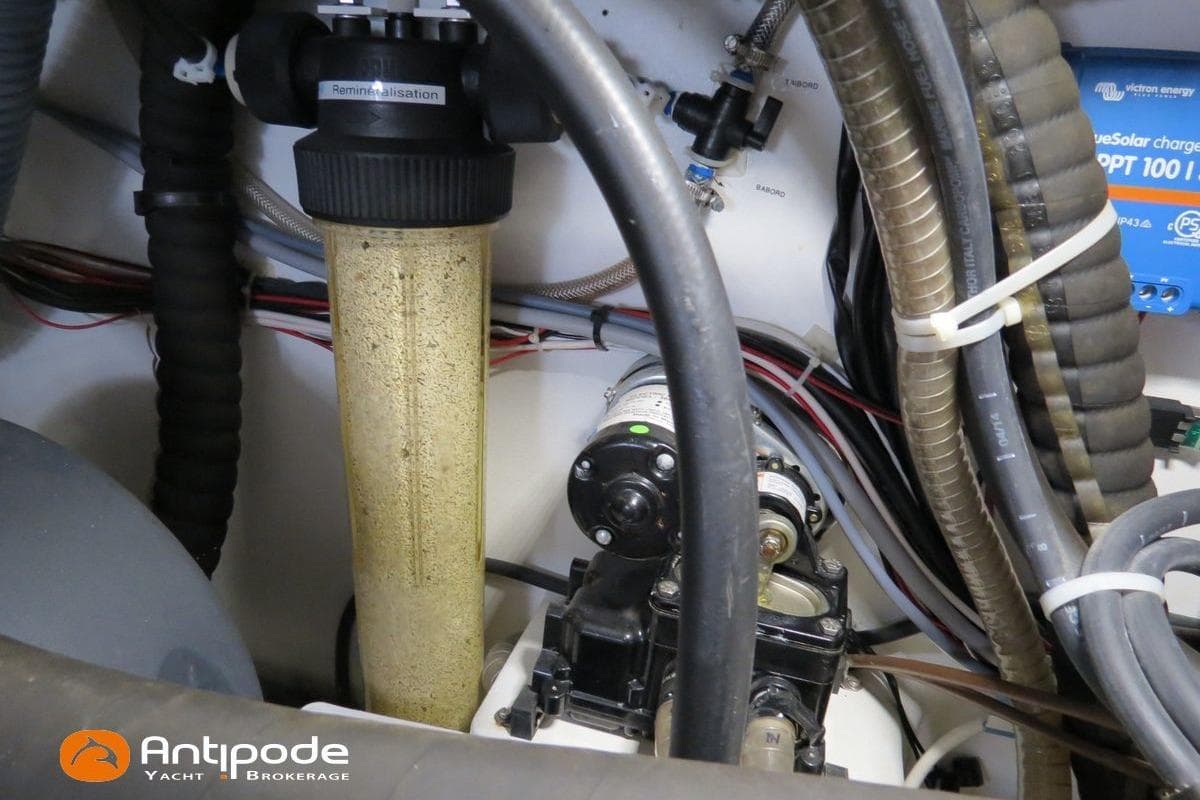 Engine compartment of a 2015 Pogo 1250 yacht with various mechanical components.