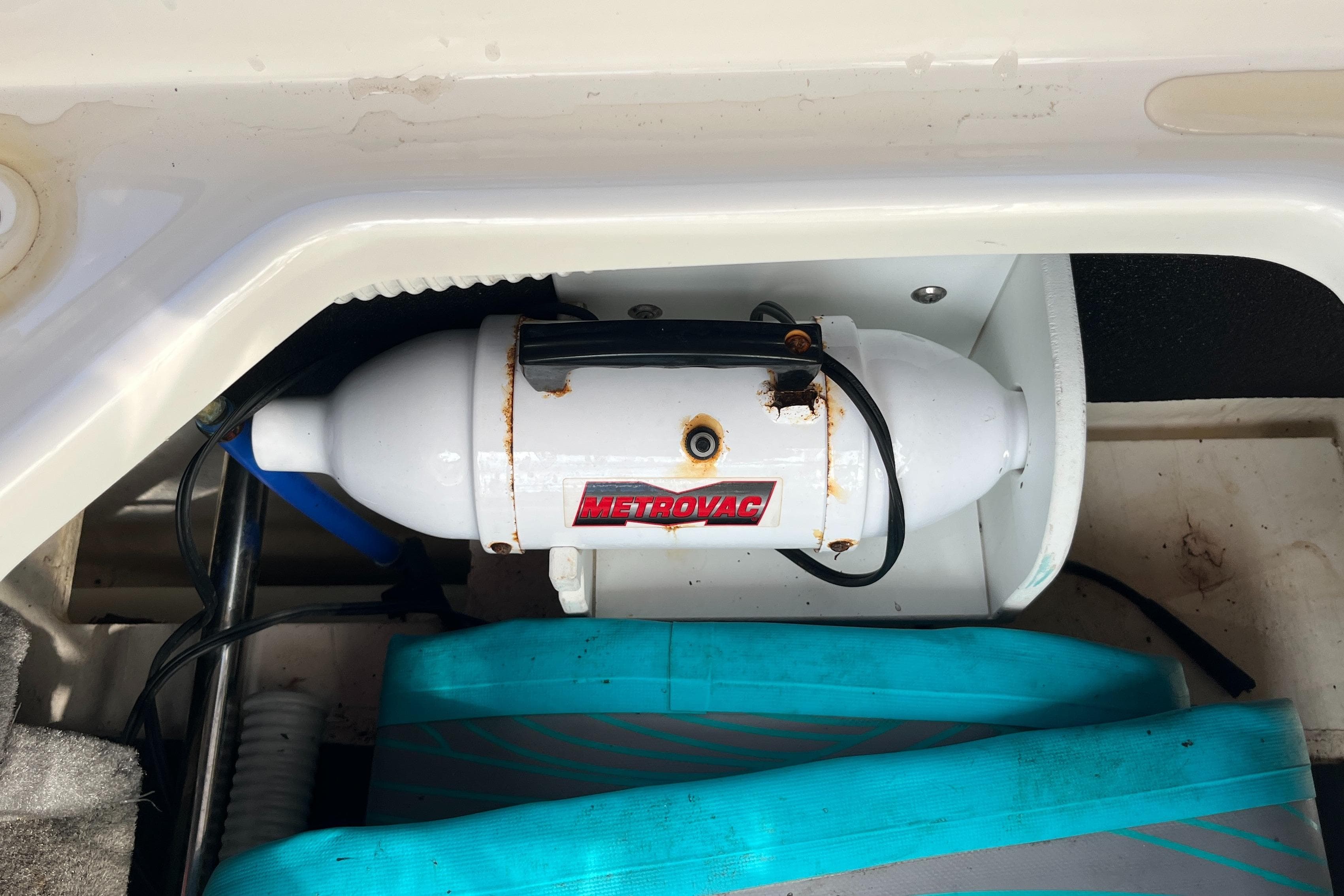 2021 Sea Ray SLX 280 boat compartment with Metrovac equipment installed.