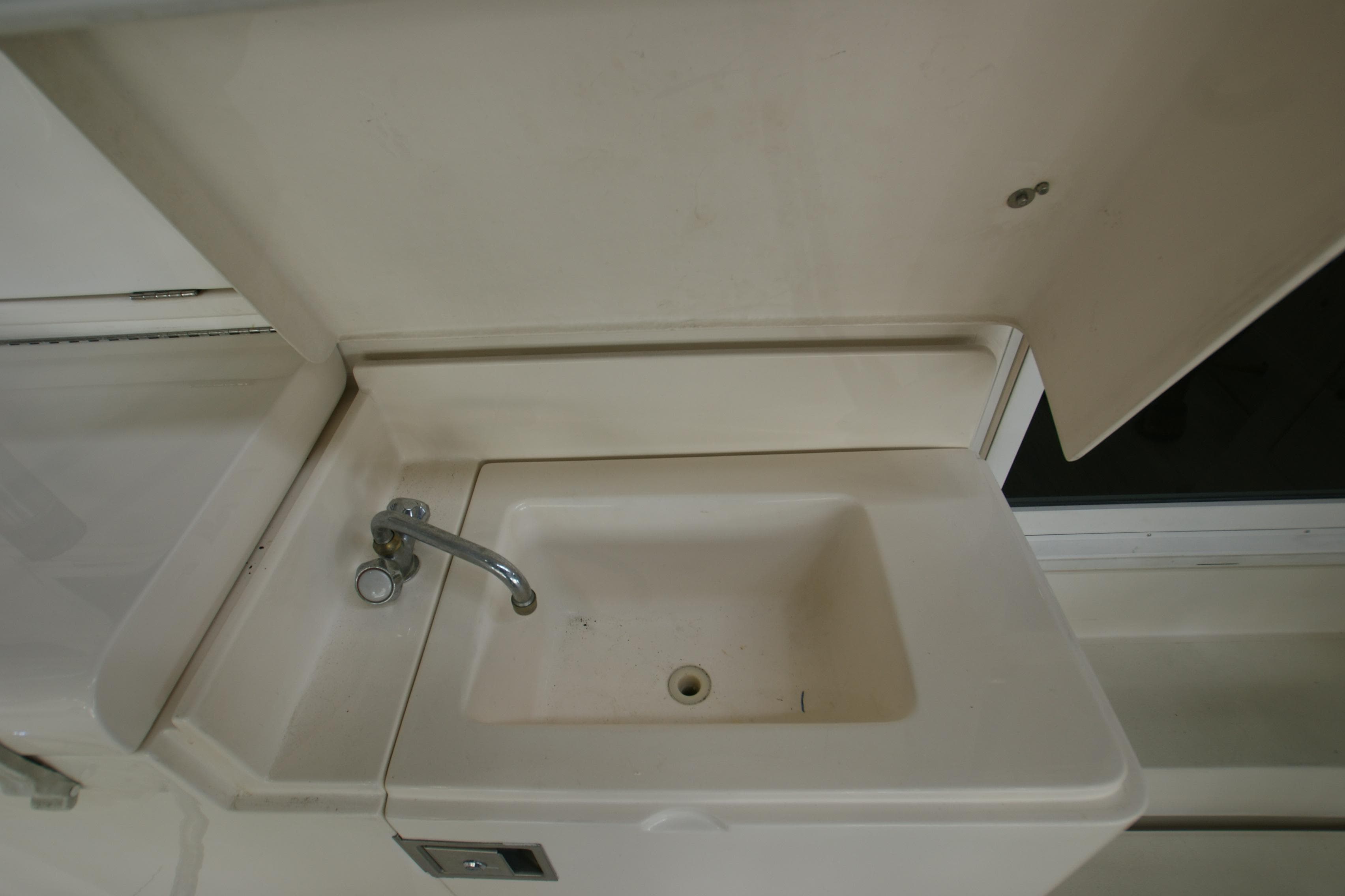 Sink on Riviera 48 Convertible yacht, year 2000.
