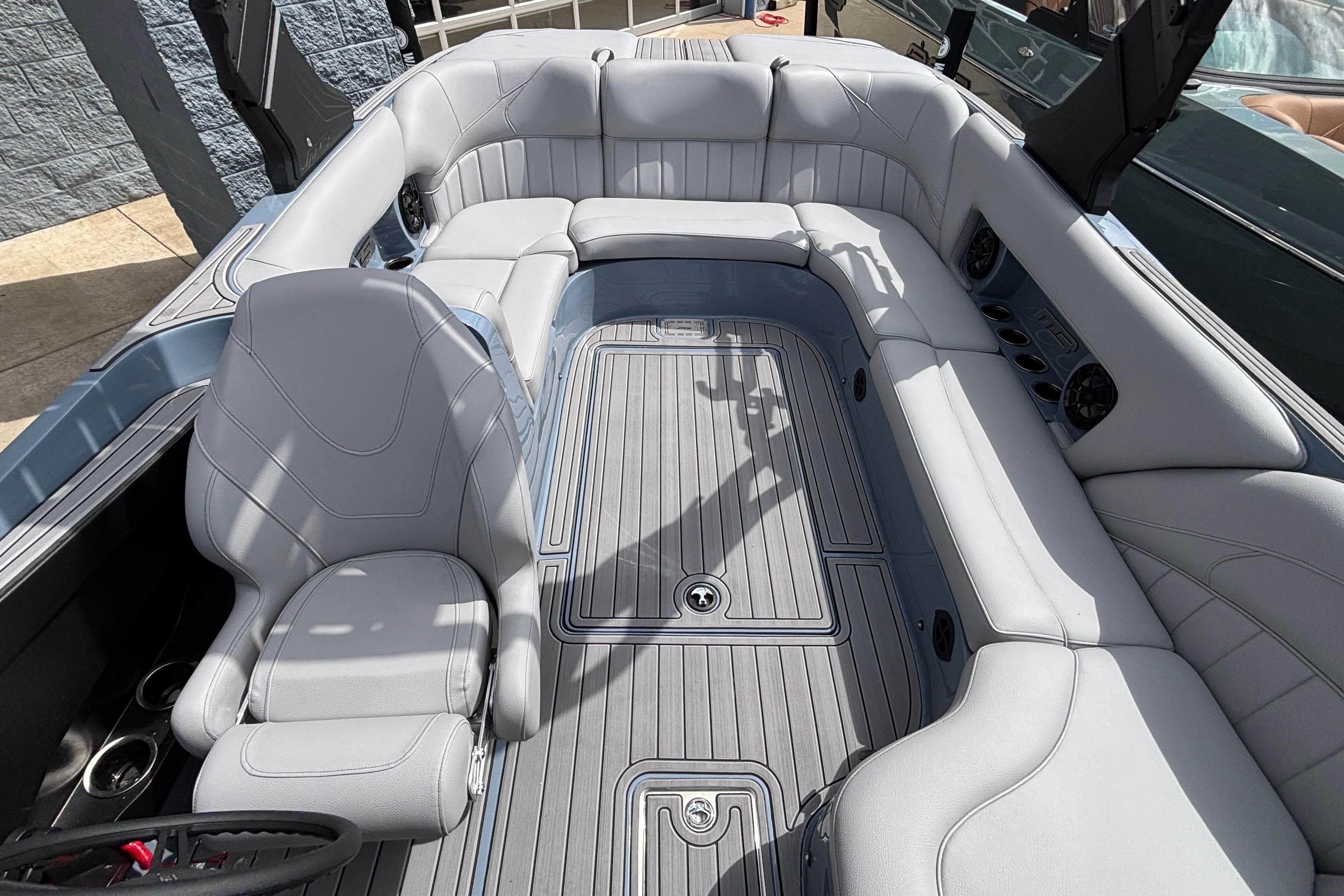 Interior of 2026 MB B52 23 Classic boat with luxurious seating and modern design.