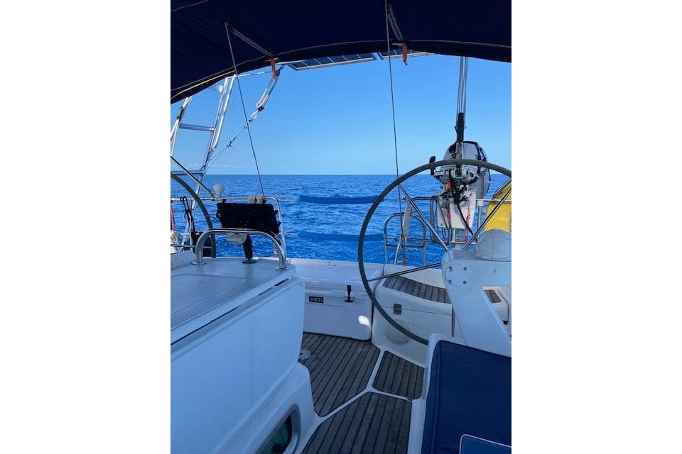 2006 Jeanneau Sun Odyssey 45 sailboat cockpit with ocean view.