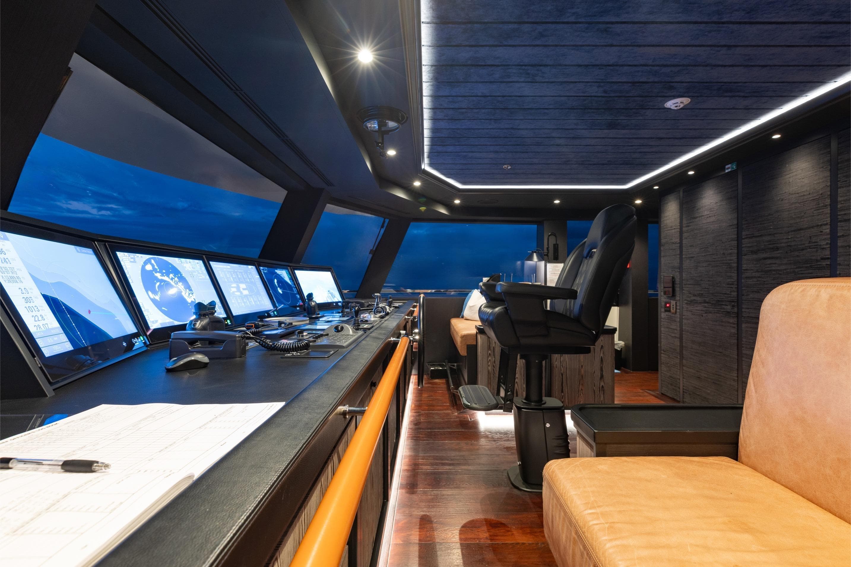 Modern bridge of 2024 Dunya Yachts Explorer with advanced navigation systems and luxurious seating.