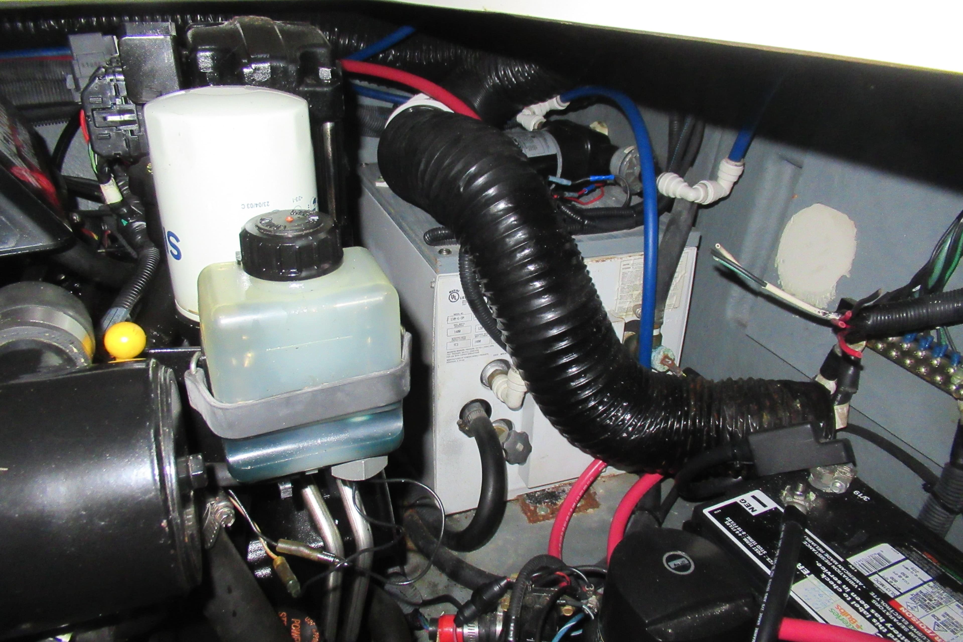 Engine compartment of a 2001 Searay 280 Sundancer with visible components and wiring.