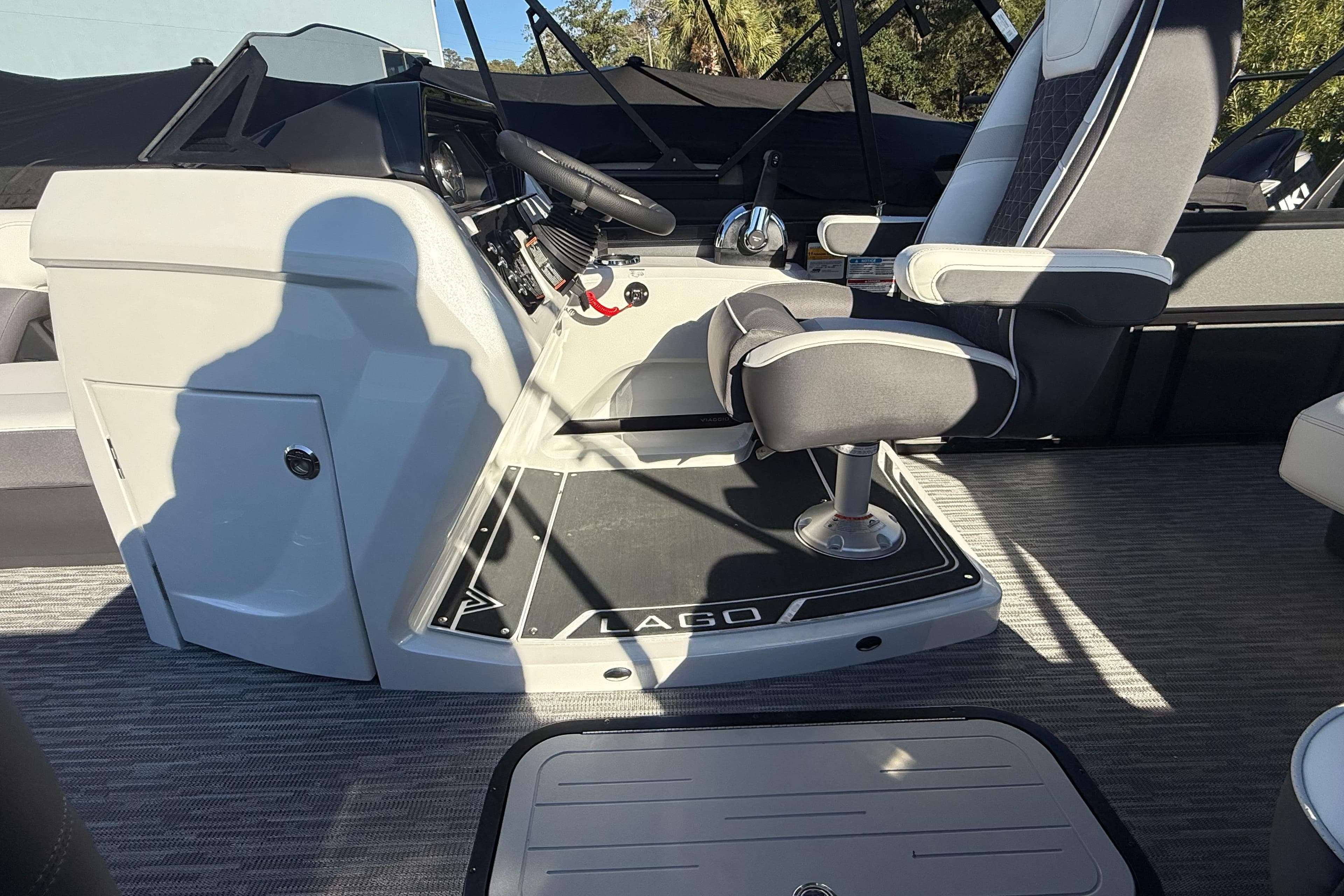 Interior of 2026 Viaggio Lago Z-S boat, featuring modern helm and seating.