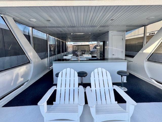 Luxurious Bravada Intrepid Share #10 yacht interior with seating and bar area, 2015 model.