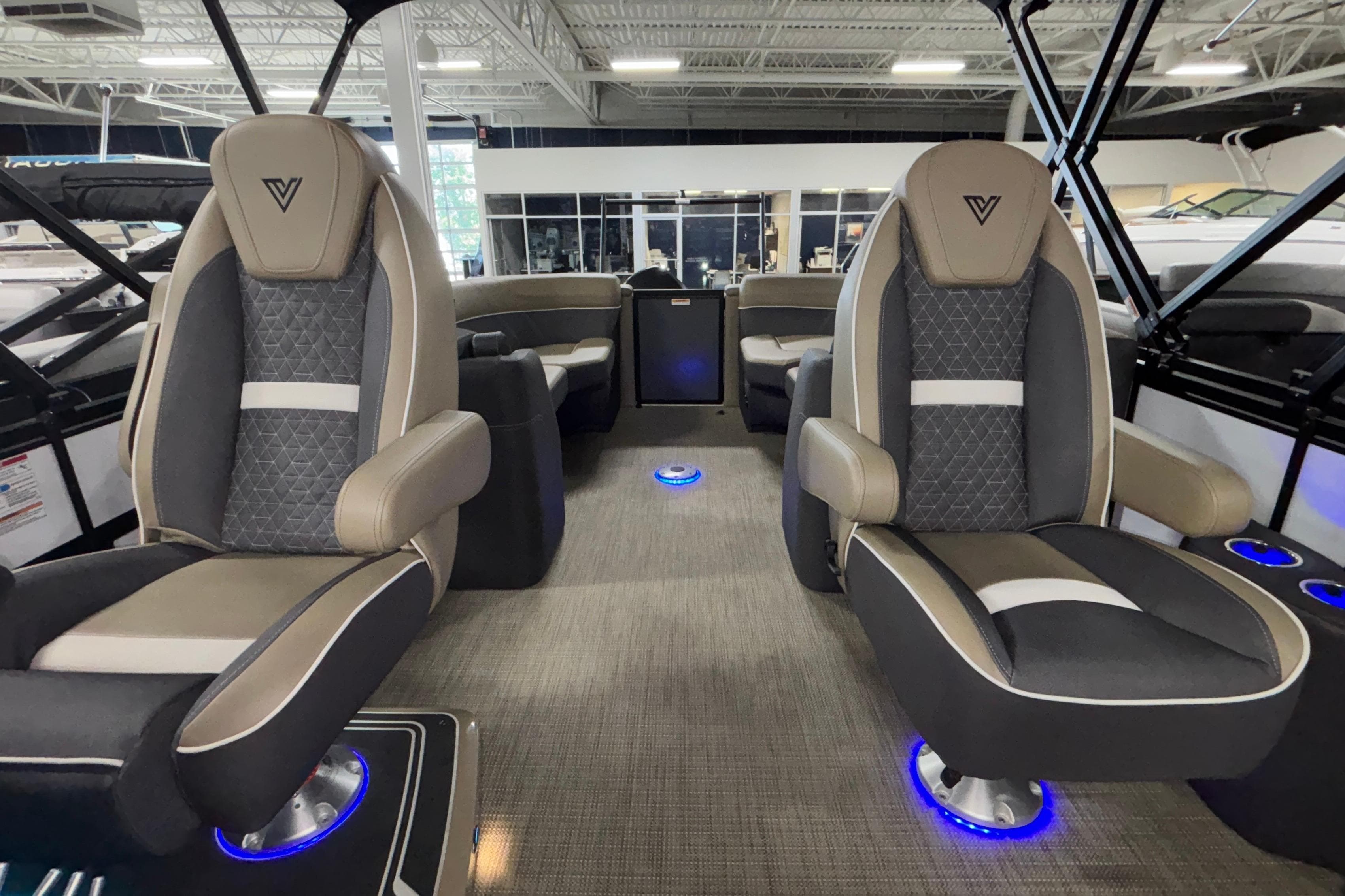 Luxurious interior of 2026 Viaggio Z24U boat with modern seating and ambient lighting.