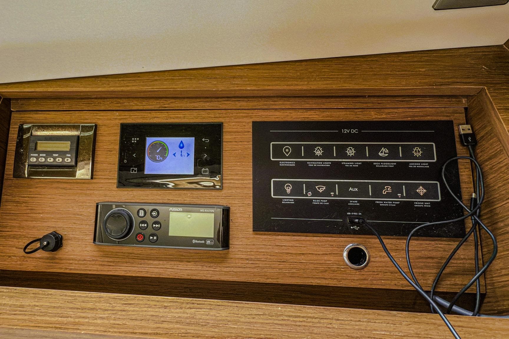 Control panel of a 2020 Beneteau Oceanis 46.1 yacht with electronic displays.