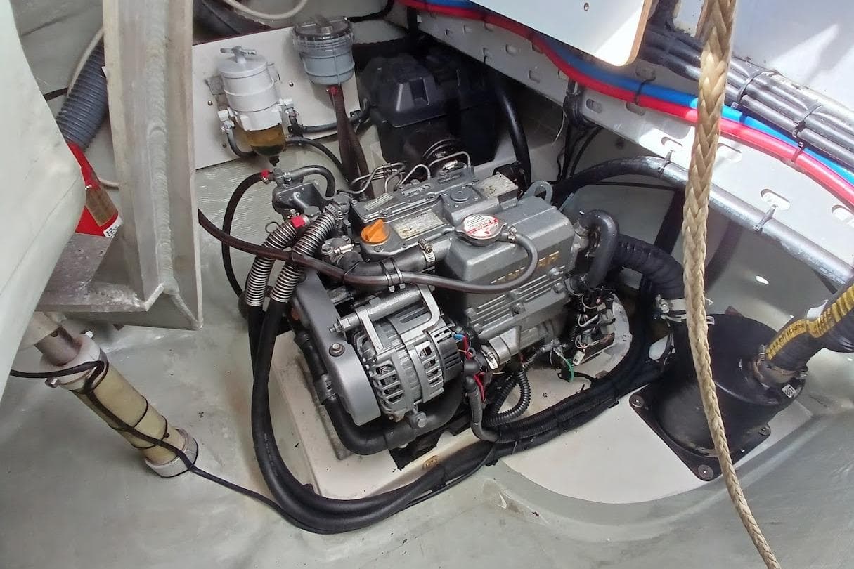 Engine compartment of a 2020 Leopard 40 catamaran, showcasing detailed mechanical components.