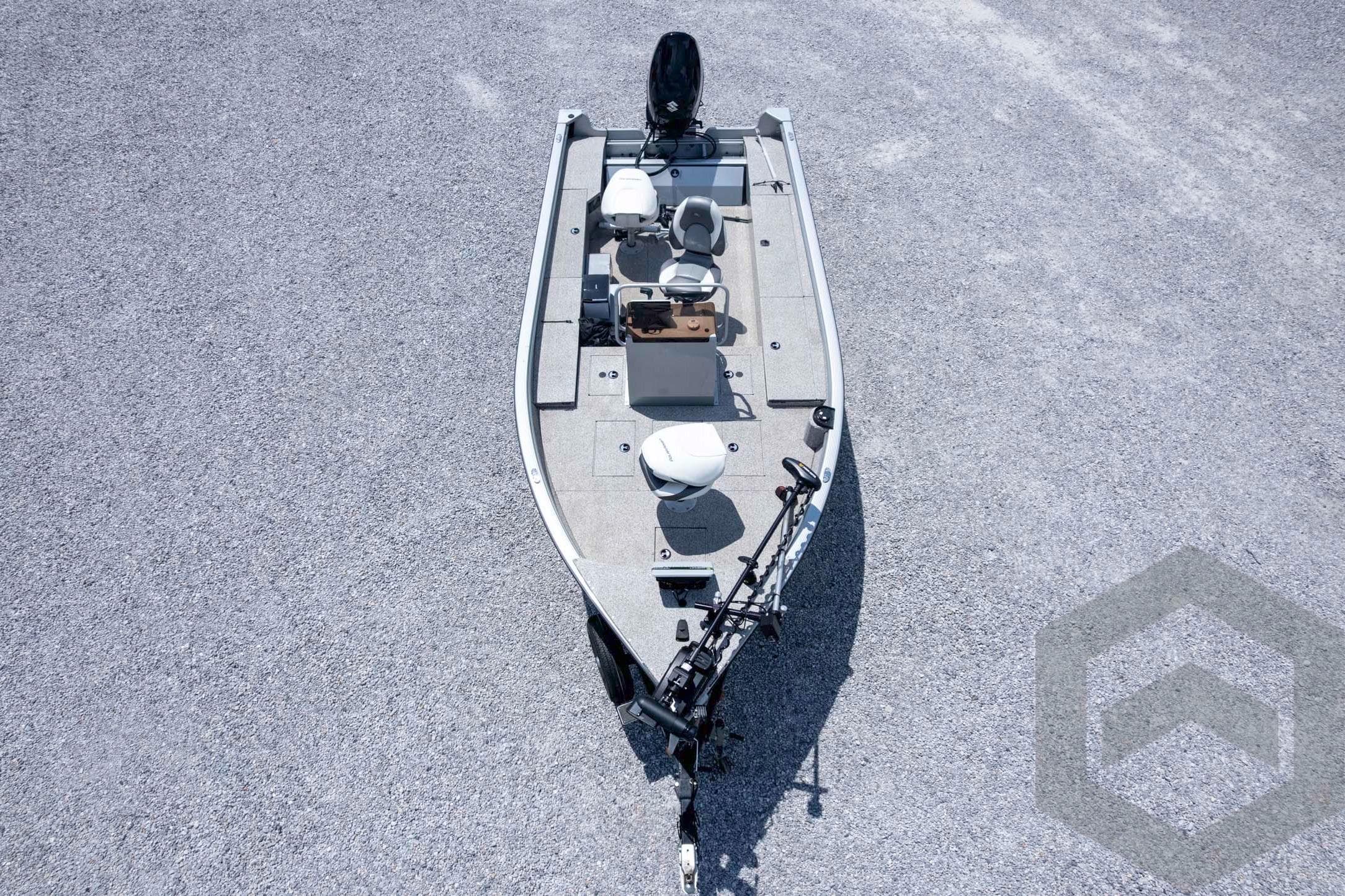 2023 Polar Kraft Outlander 186 CC boat on gravel surface, aerial view.
