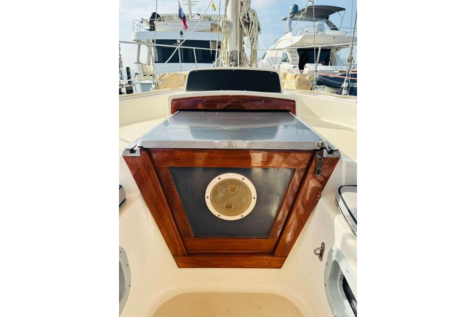 Cockpit view of 1982 Steven Custom Stevens 47 sailboat with wooden hatch detail.