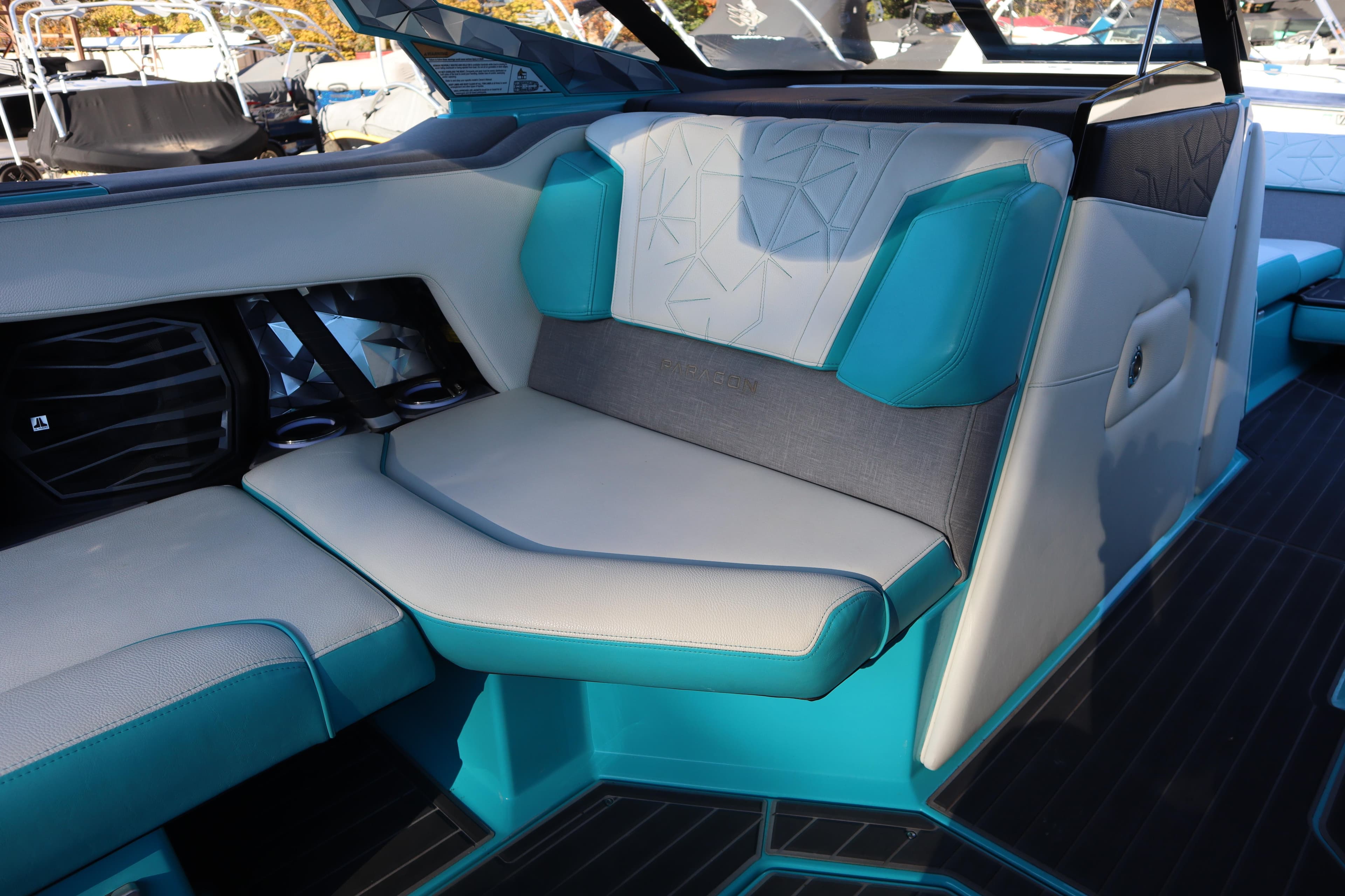 2021 Nautique Super Air Nautique G23 Paragon interior with teal and gray seating.