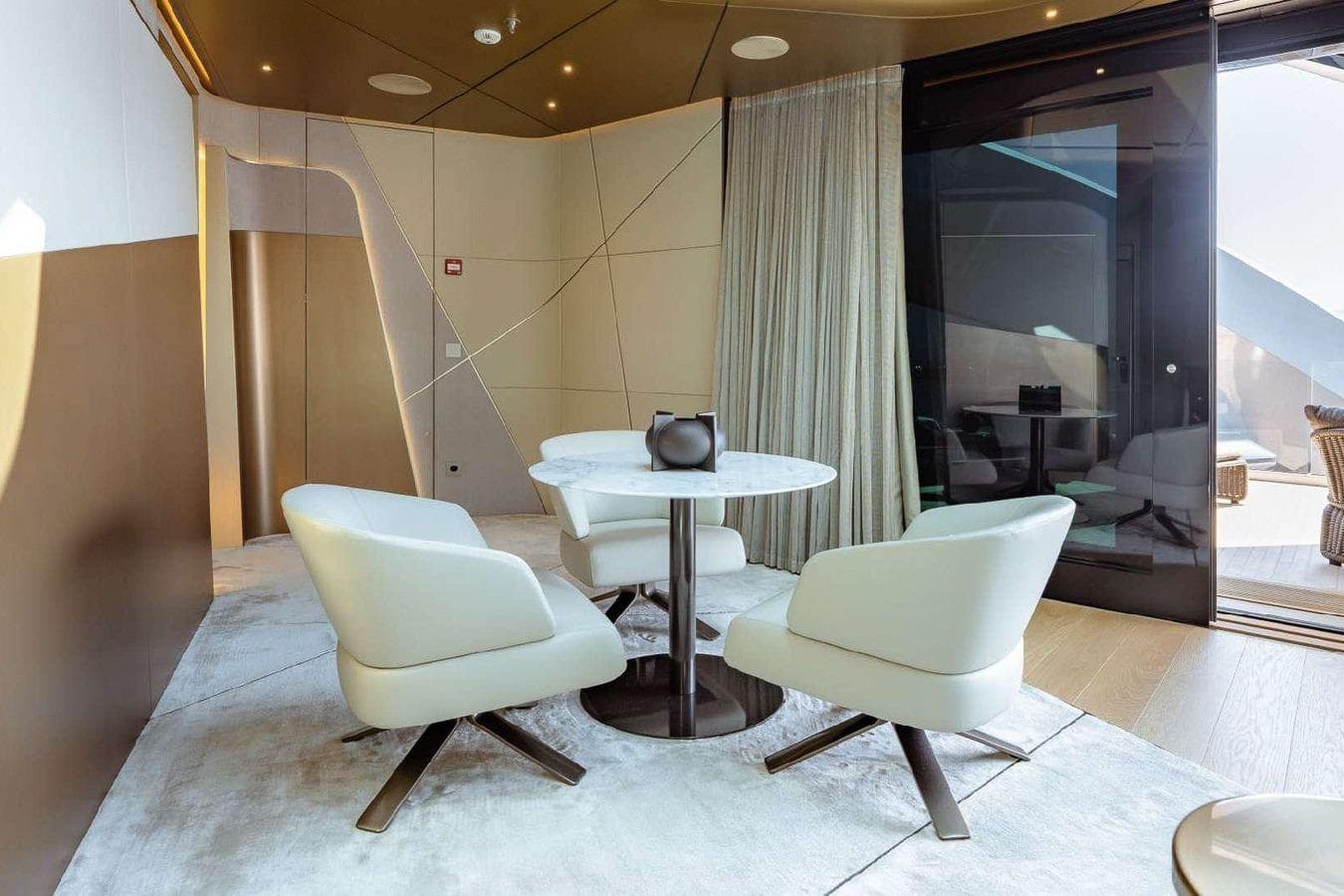 Luxurious interior of 2024 Tecnomar Catamaran 44 with modern seating and elegant decor.