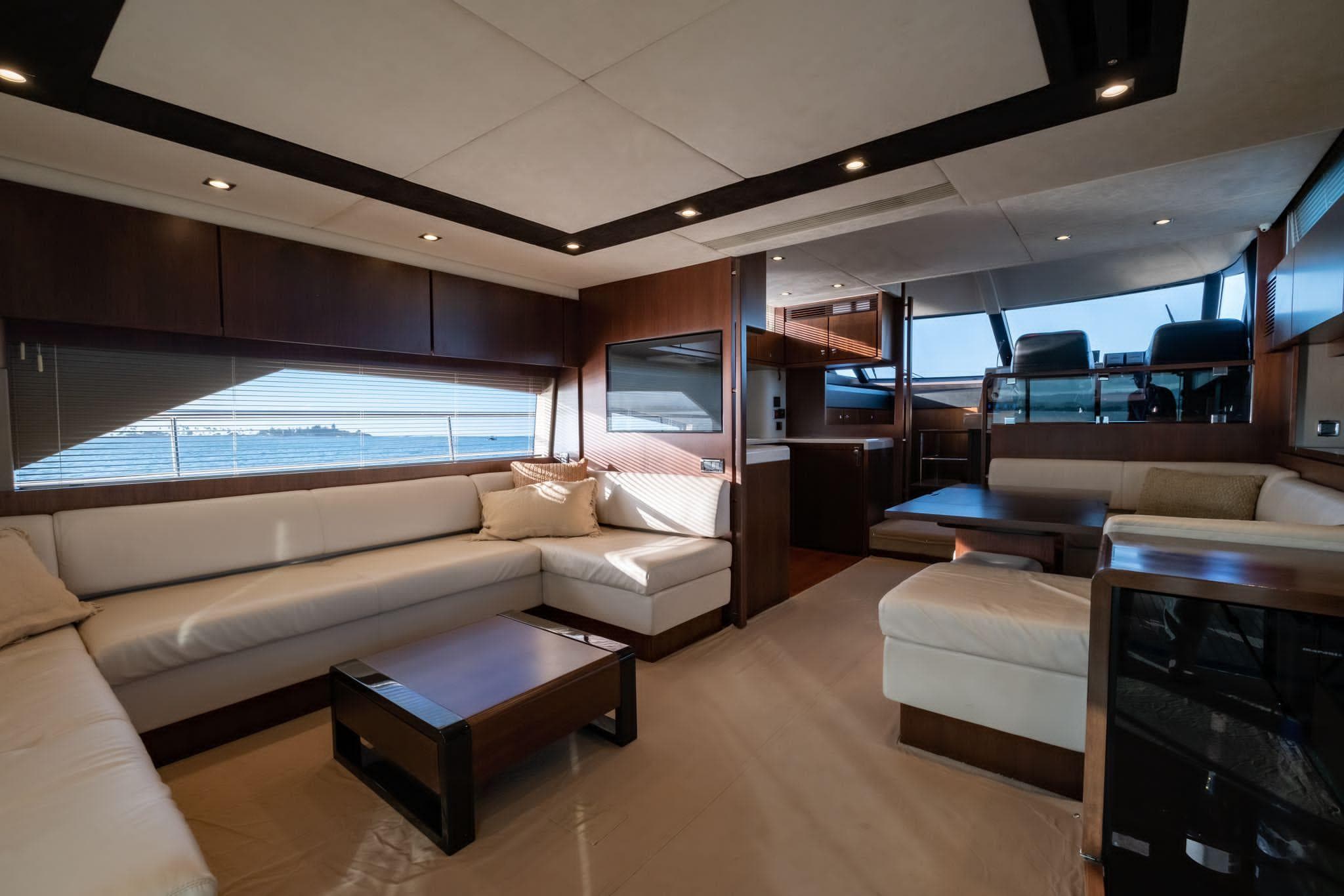 Luxurious interior of 2013 Fairline Squadron 65 yacht with elegant seating and modern design.