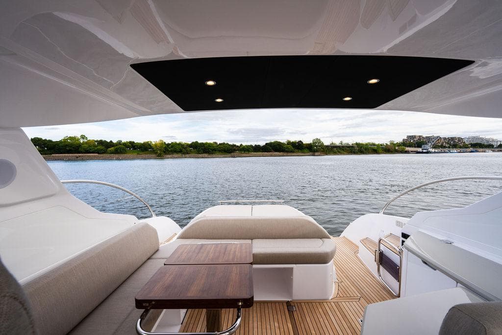 Luxurious 2025 Azimut Atlantis 45 yacht interior with scenic water view.