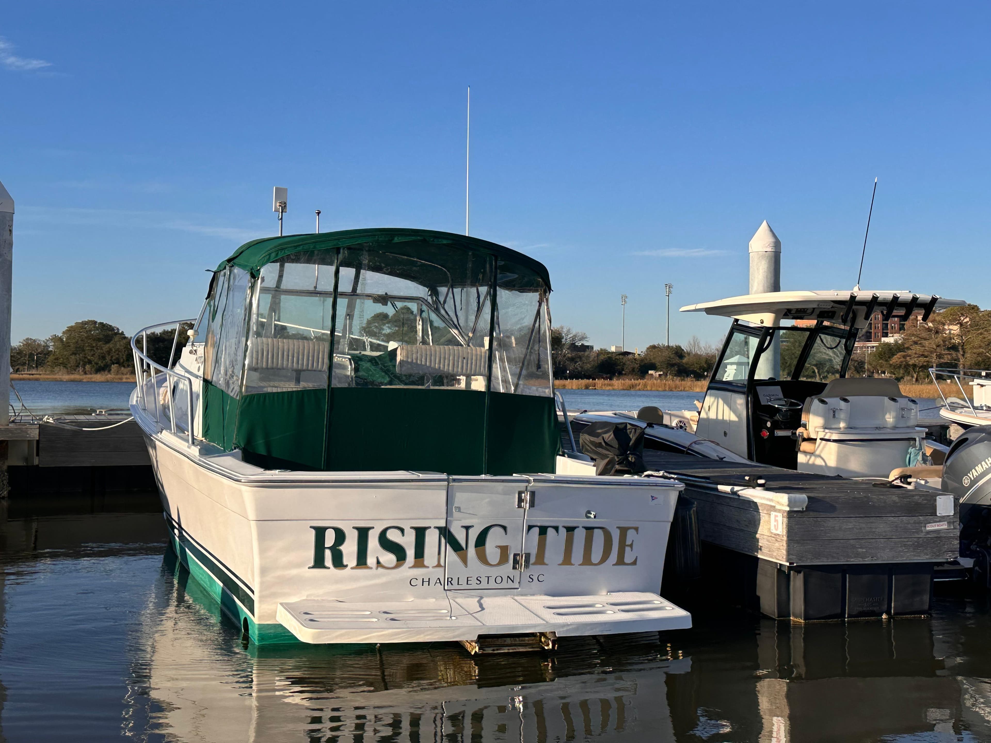 2001 Mainship Pilot 30 boat named "Rising Tide" docked in Charleston, SC.