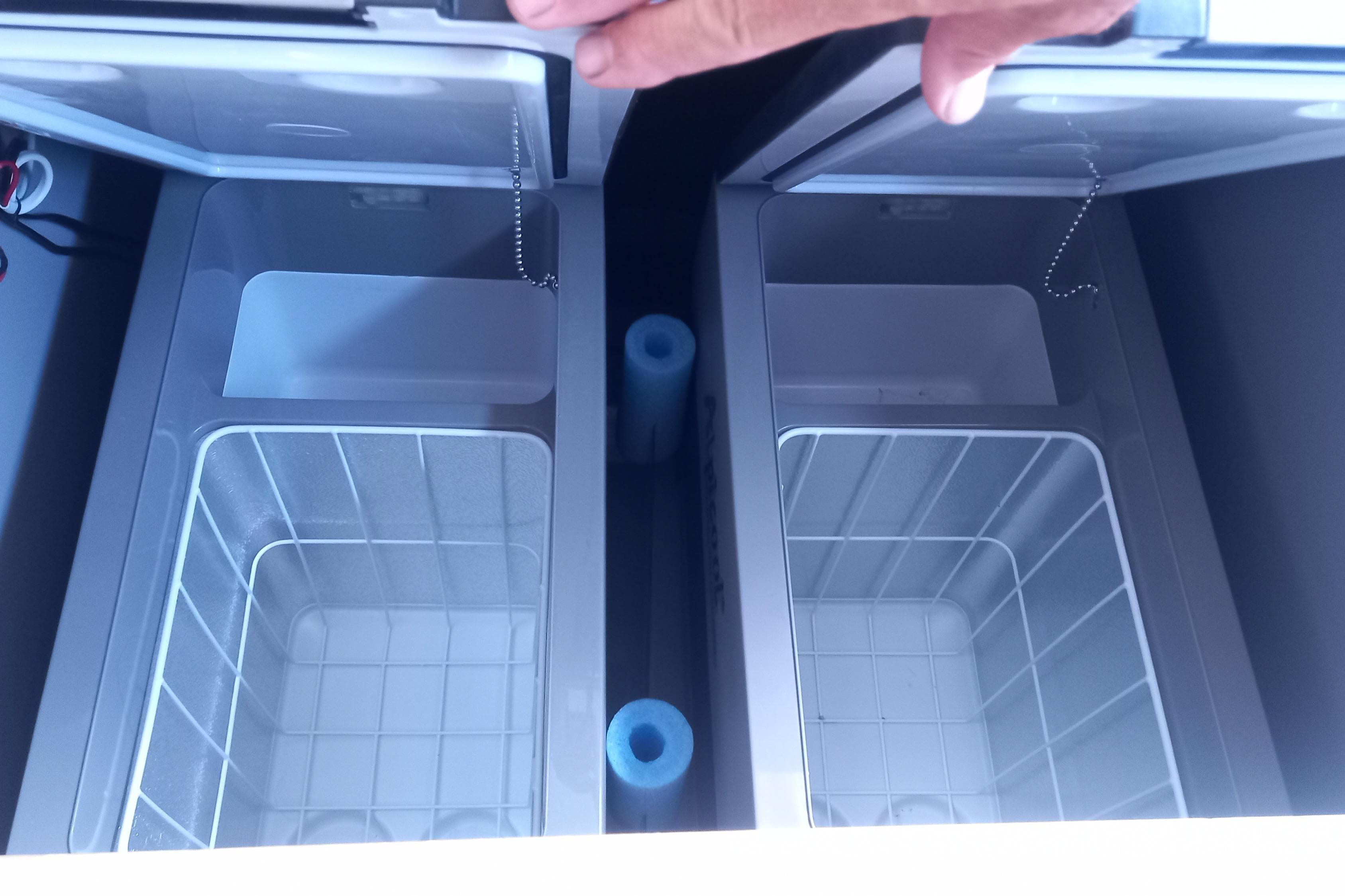 Open dual compartments of a Leopard 45 yacht refrigerator, 2019 model.