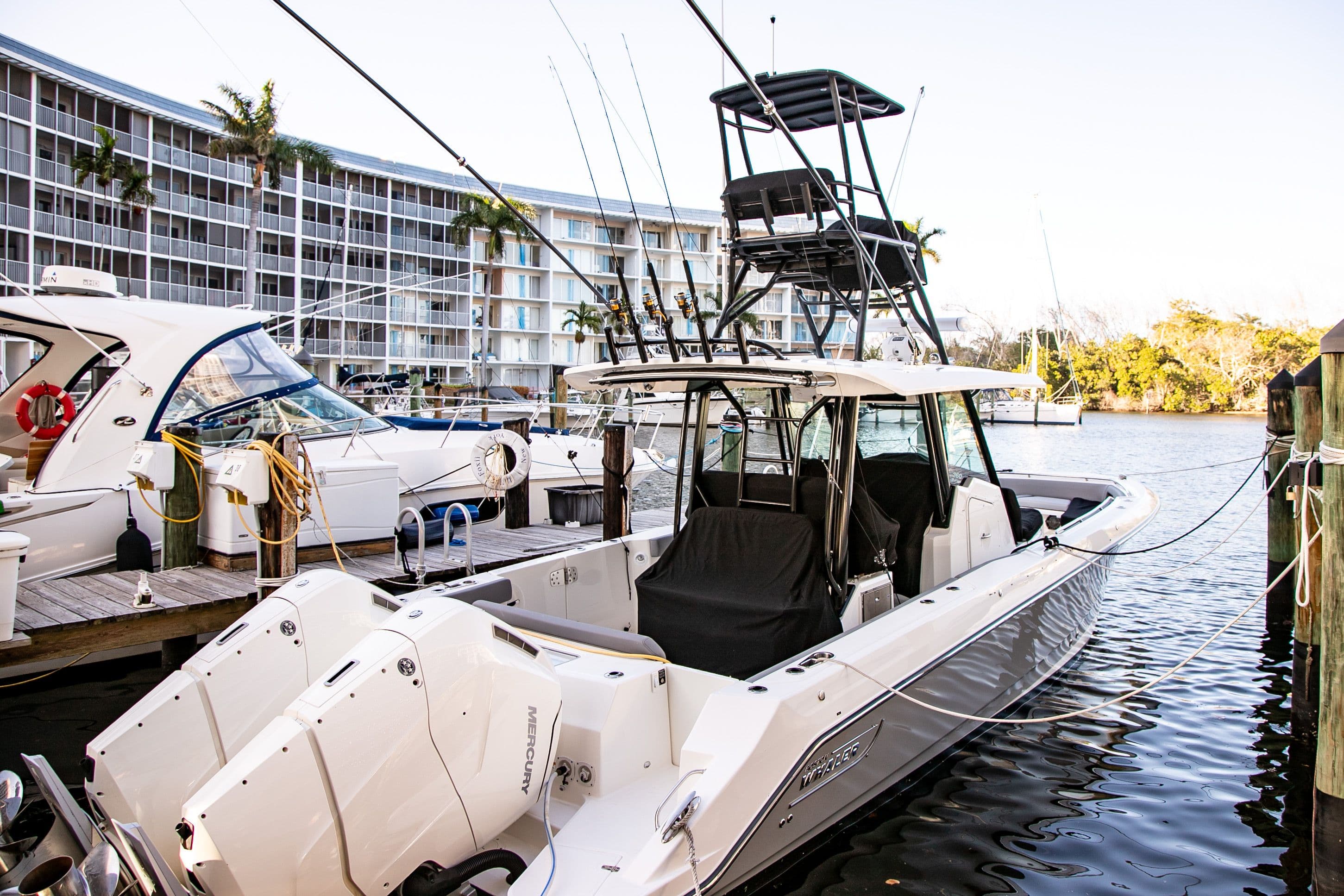 2023 Boston Whaler 360 Outrage boat docked at marina.
