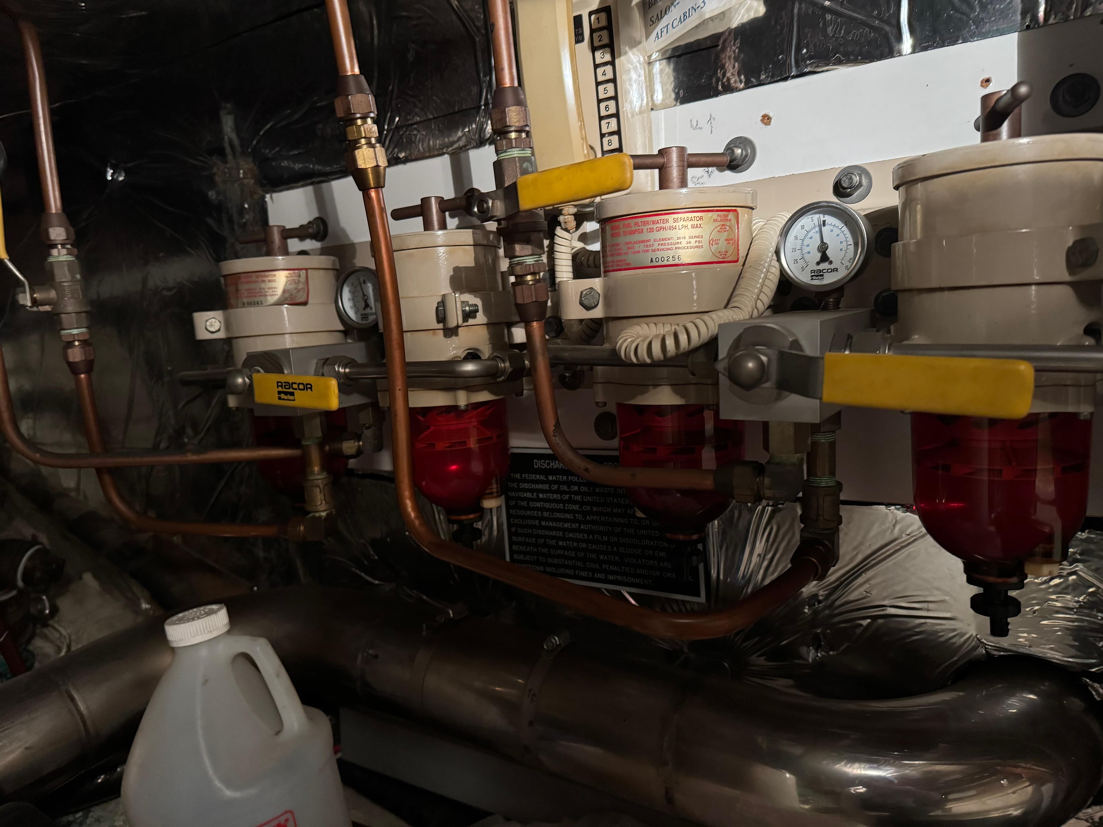 Engine room with fuel filters and gauges, Nova 48, 1990 model.