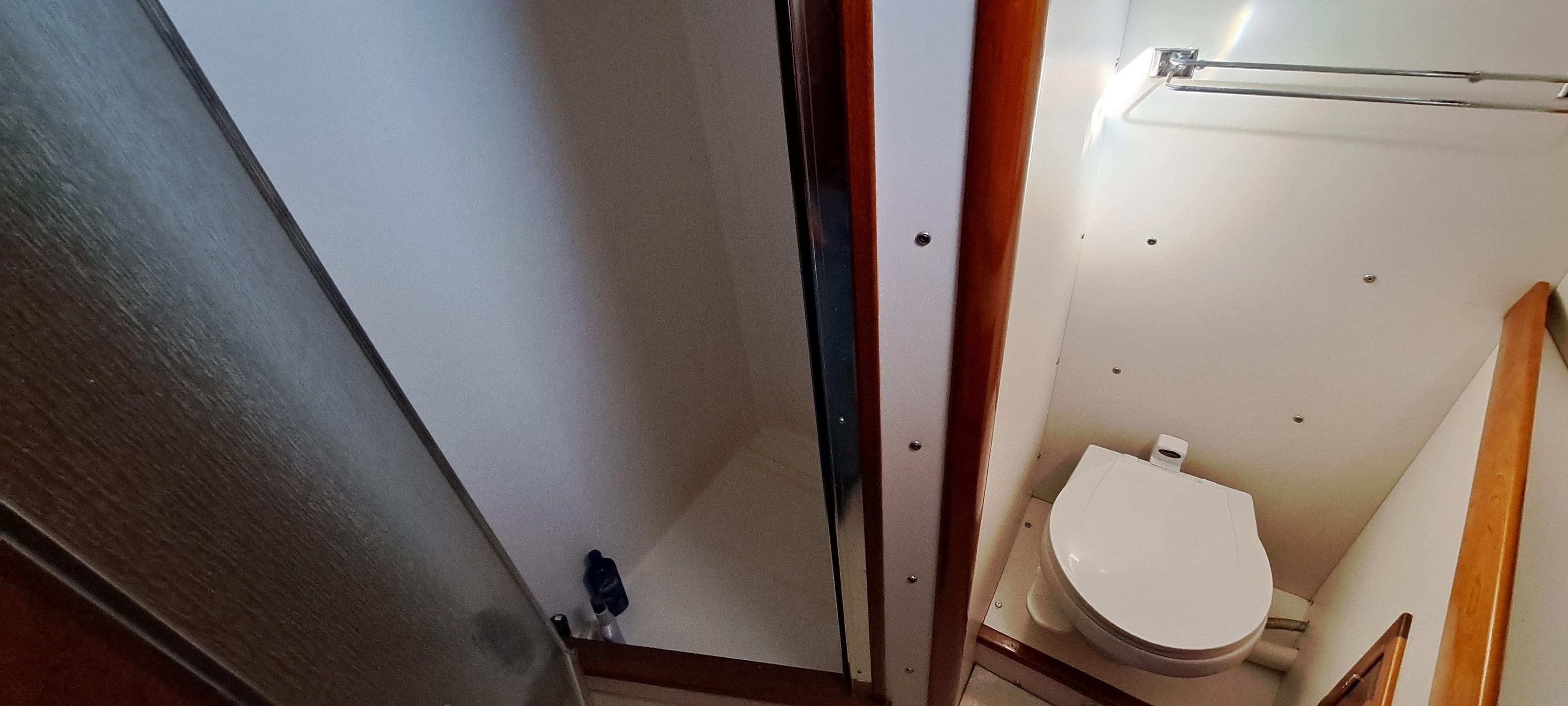 1999 Rozema Boat Works Custom 42 bathroom with toilet and shower