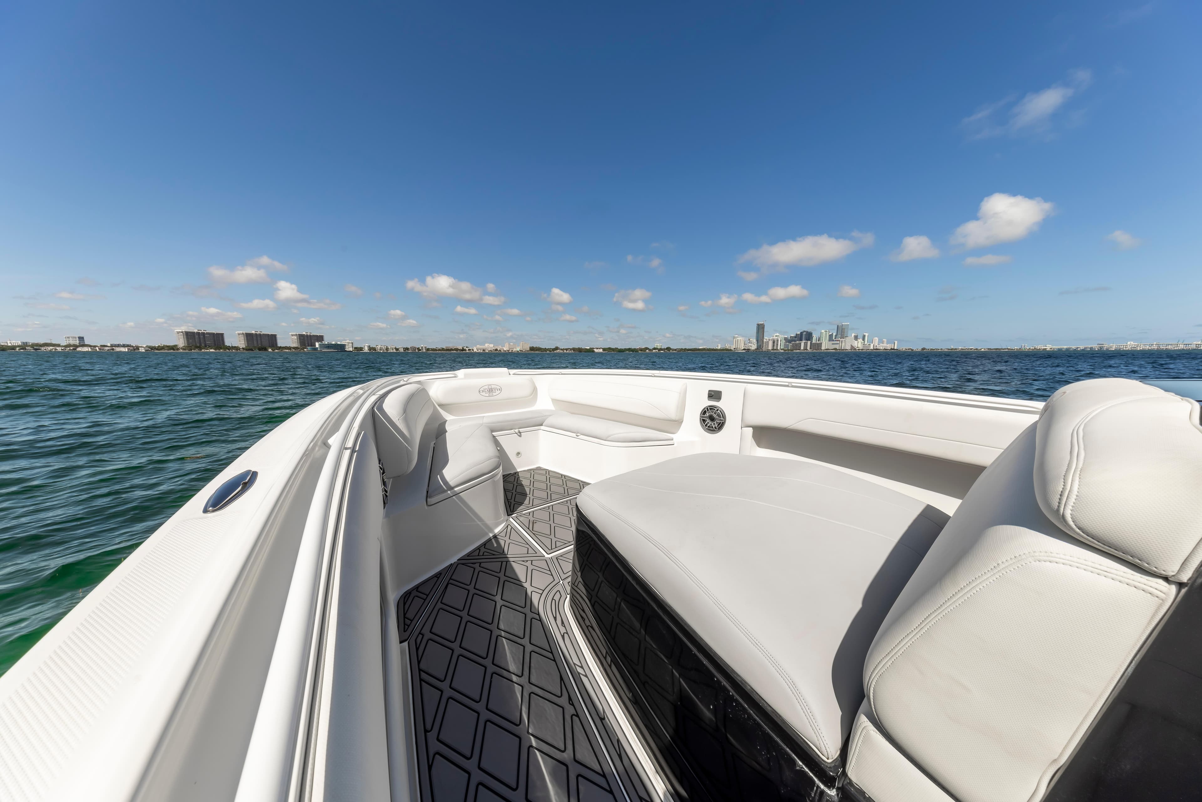 2016 Cigarette 41 GTR boat interior with ocean view and city skyline.