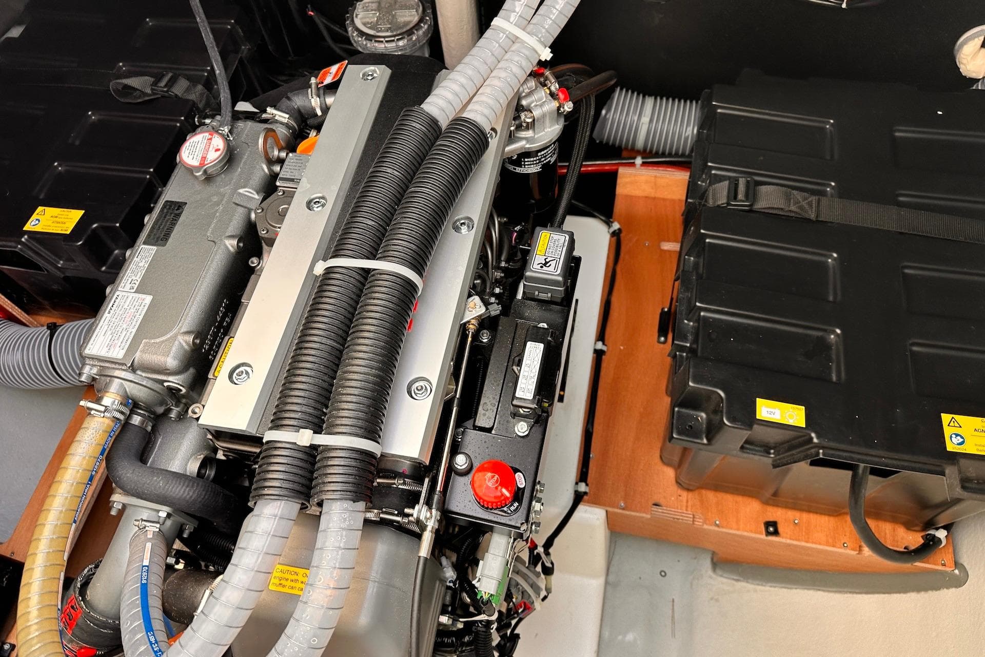 Engine compartment of 2026 Lagoon 43 yacht, showcasing detailed mechanical components.