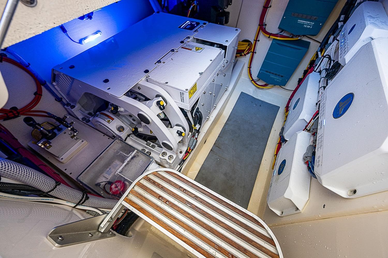 Engine room of 2025 Scout 425 LXF boat with advanced electrical systems and components.