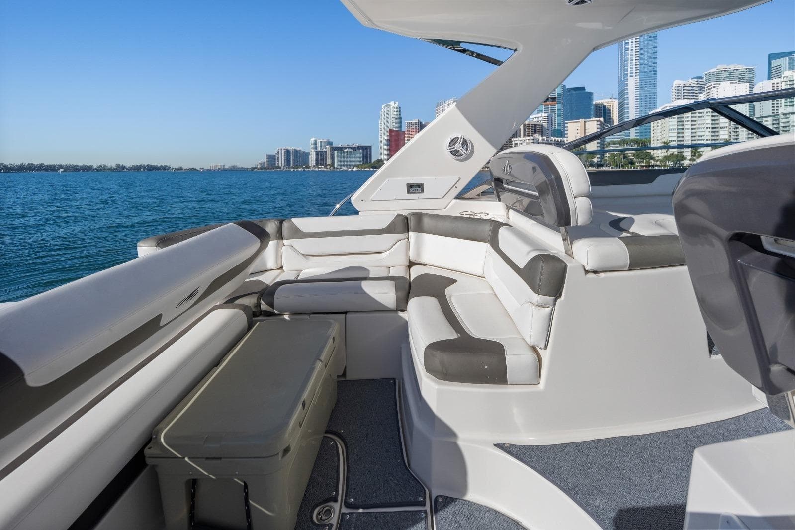 2012 Monterey 400 Sport Yacht interior with city skyline and ocean view.