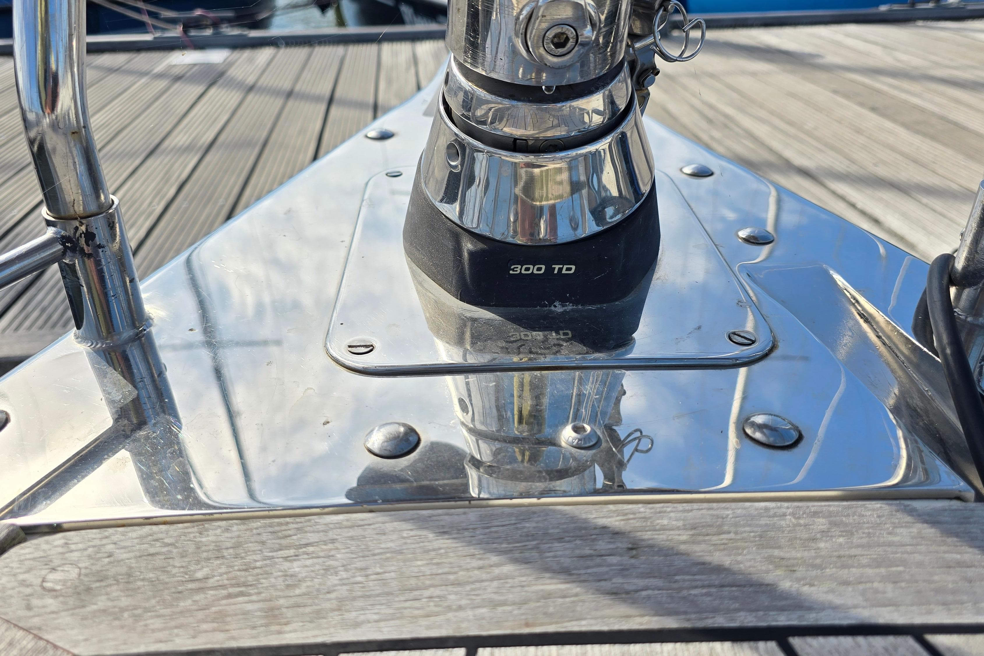 Close-up of a 2002 Comfortina 42 yacht's polished metal deck fitting.