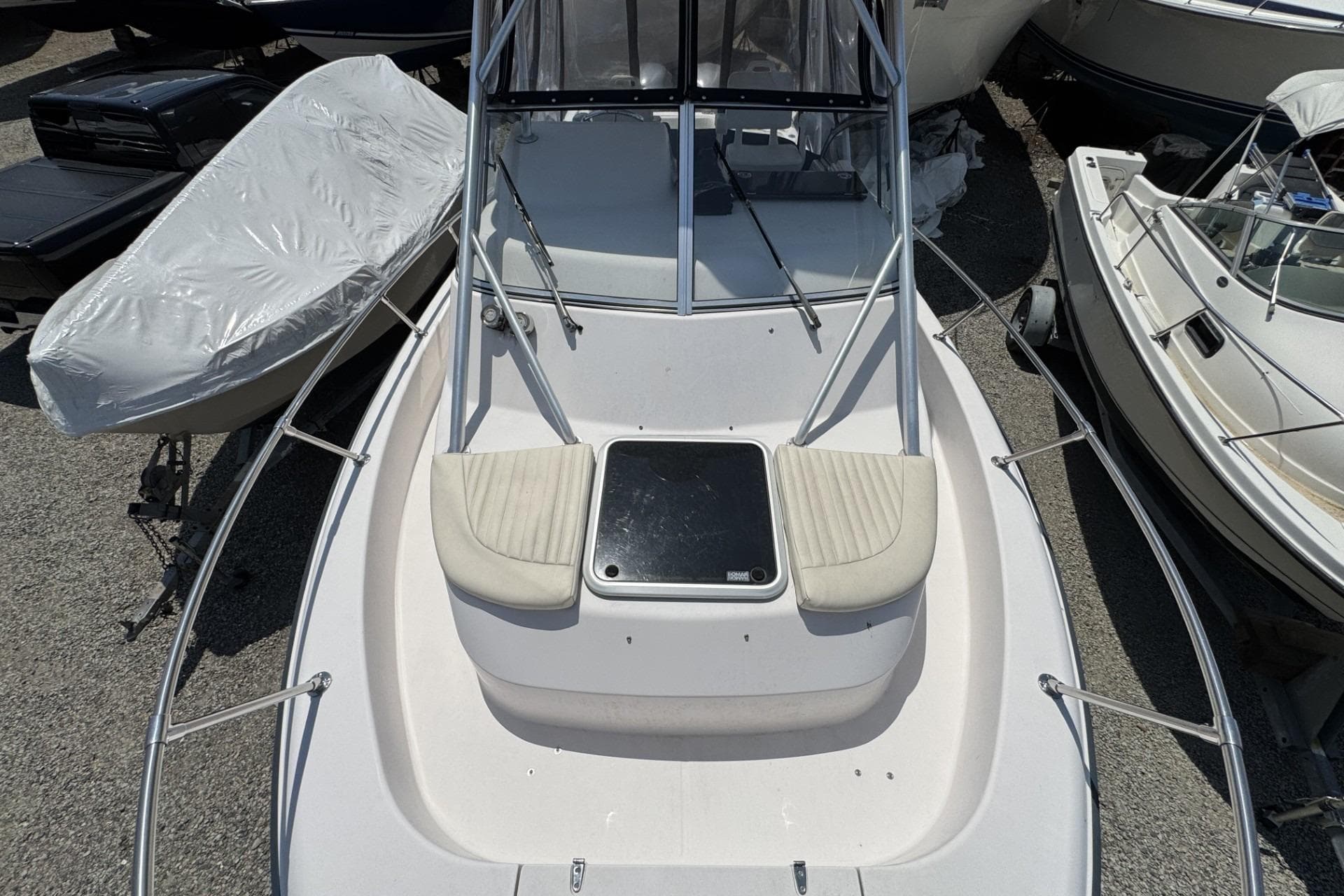 2003 Grady-White Sailfish 282 boat, top view, docked among other boats.