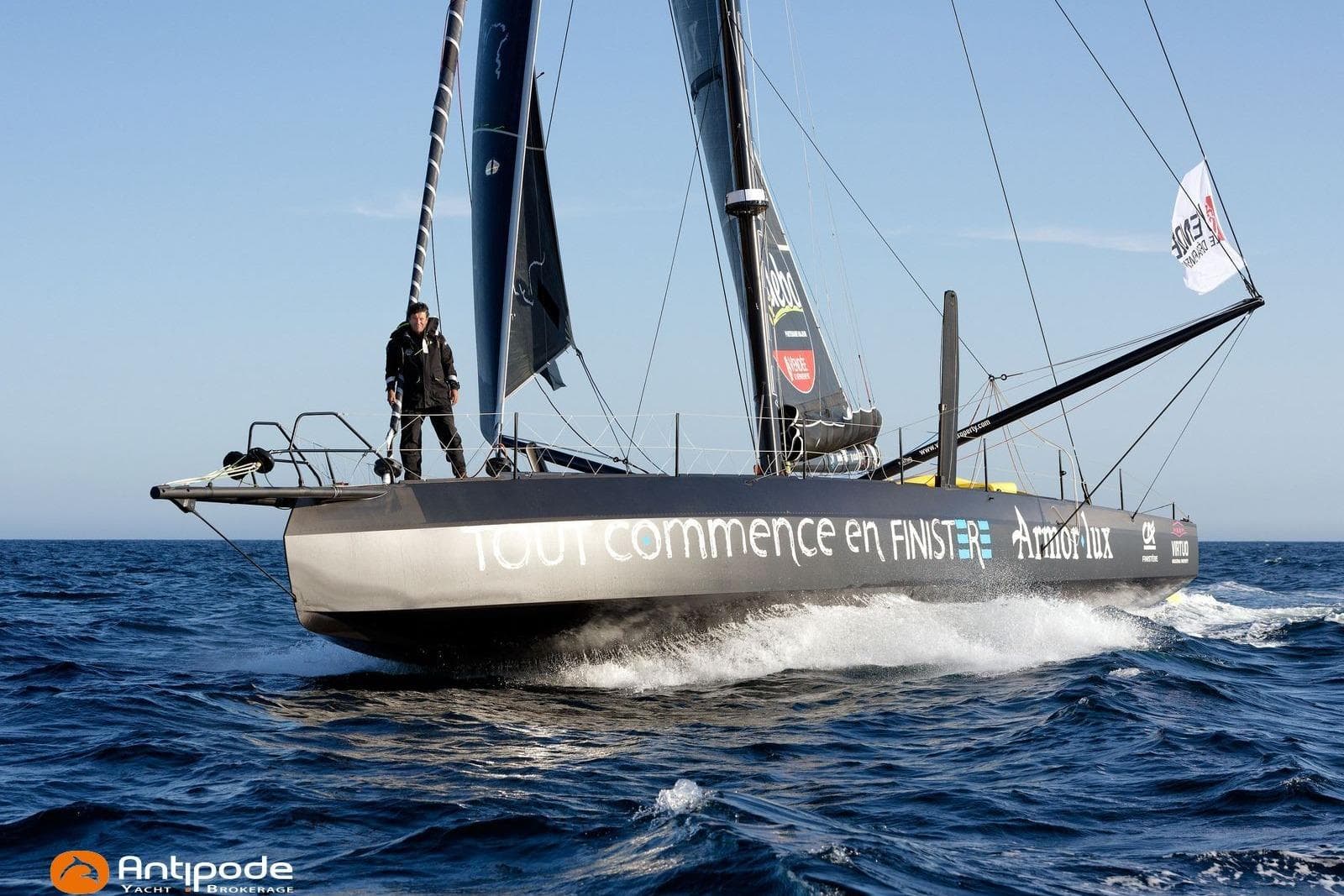 Sailing yacht Persico Imica 2023 navigating ocean waves, showcasing sleek design and performance.